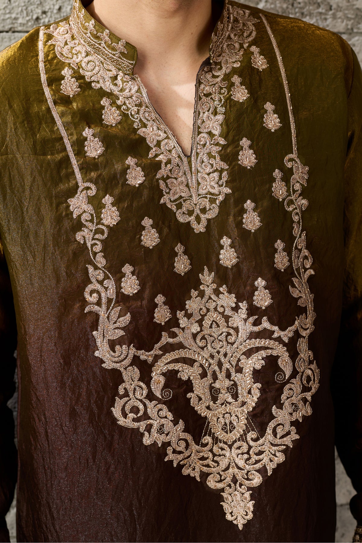 Front view of men's mehndi green kurta with crush tissue fabric