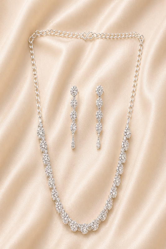 silver tone crystal necklace set with round stones