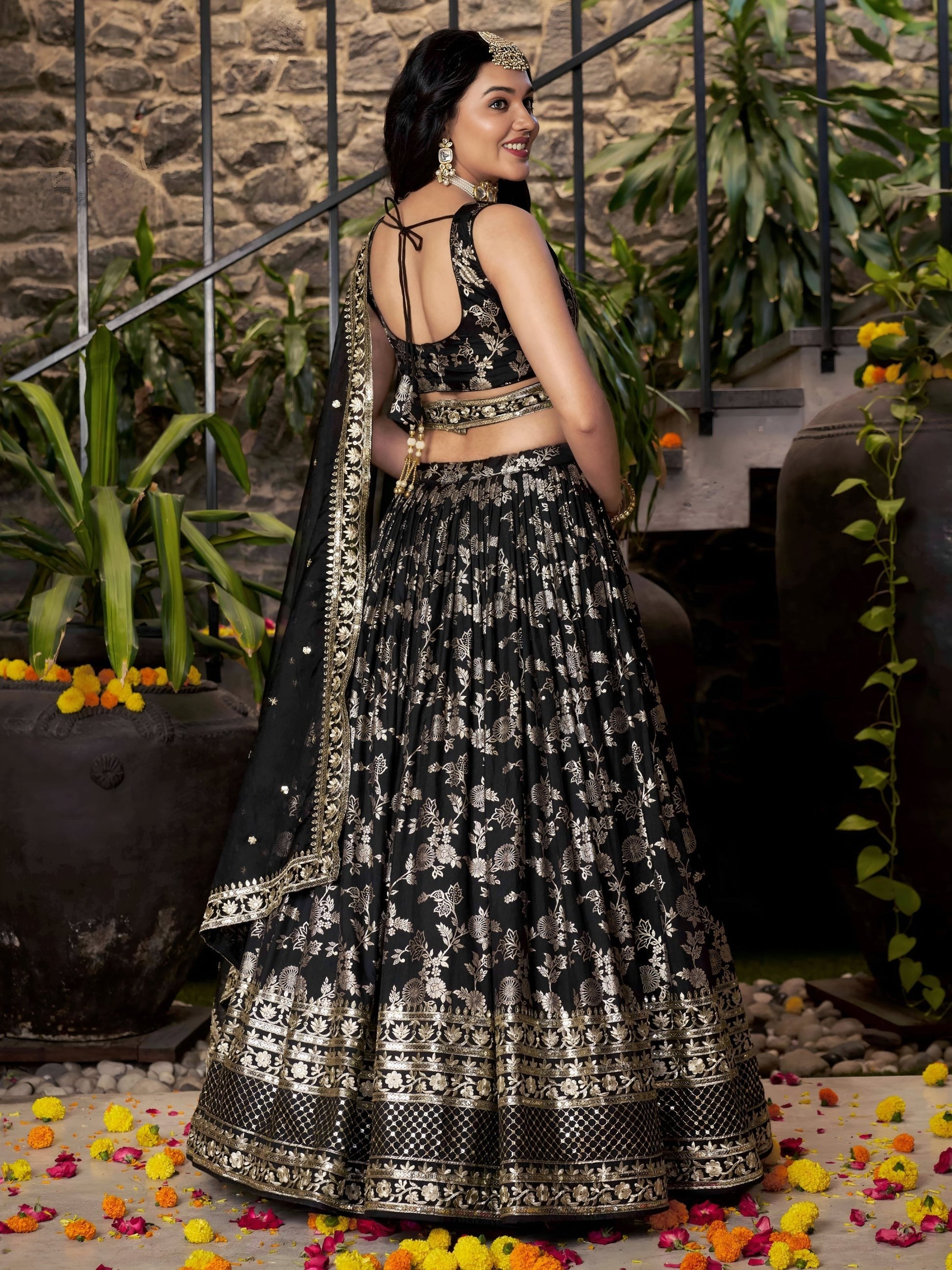 Black ghagra choli styled for engagement event