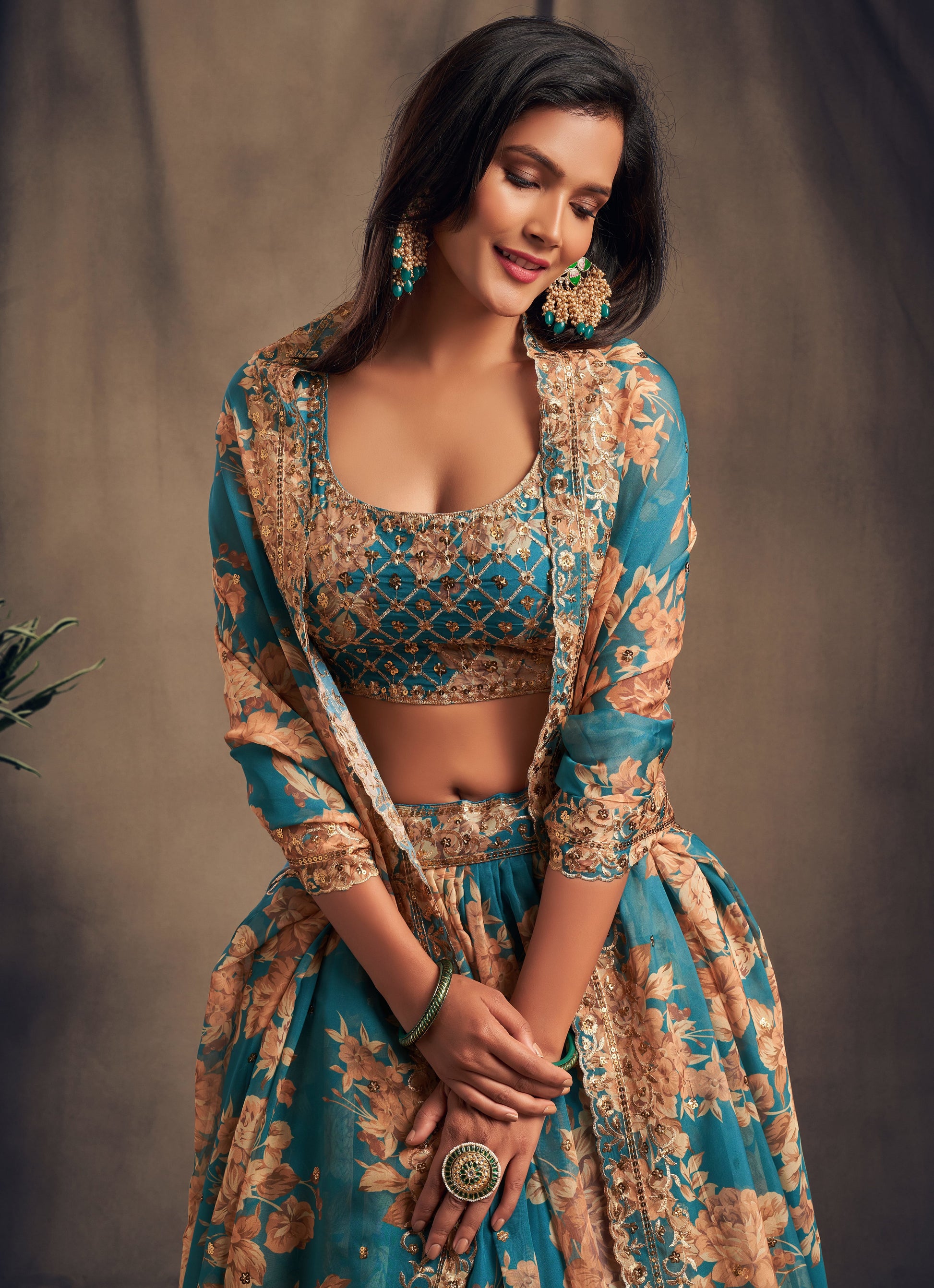 Close-up of organza lehenga fabric with sequence work detail