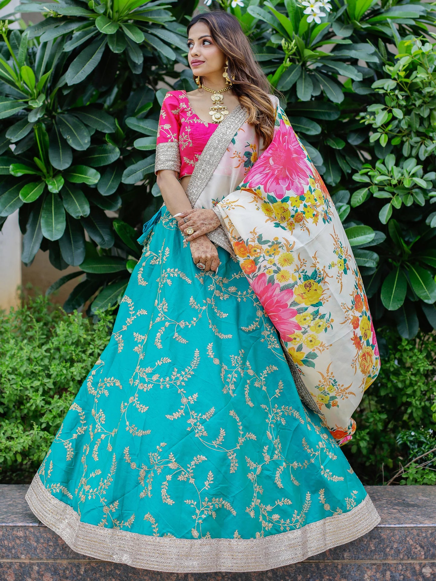 Dupatta embroidery detail on cyan reception lehenga