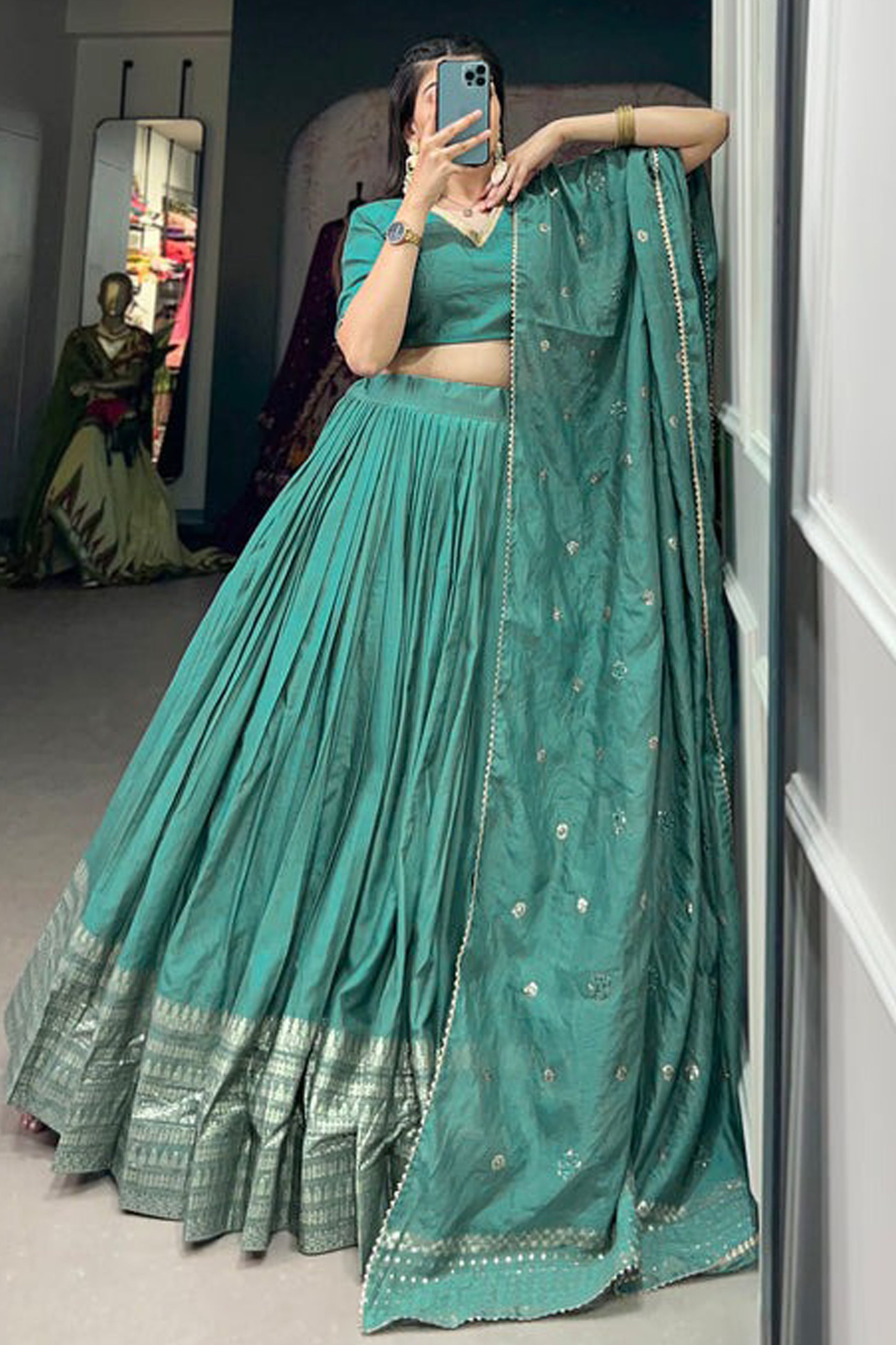 Designer lehenga sets in cyan for wedding event