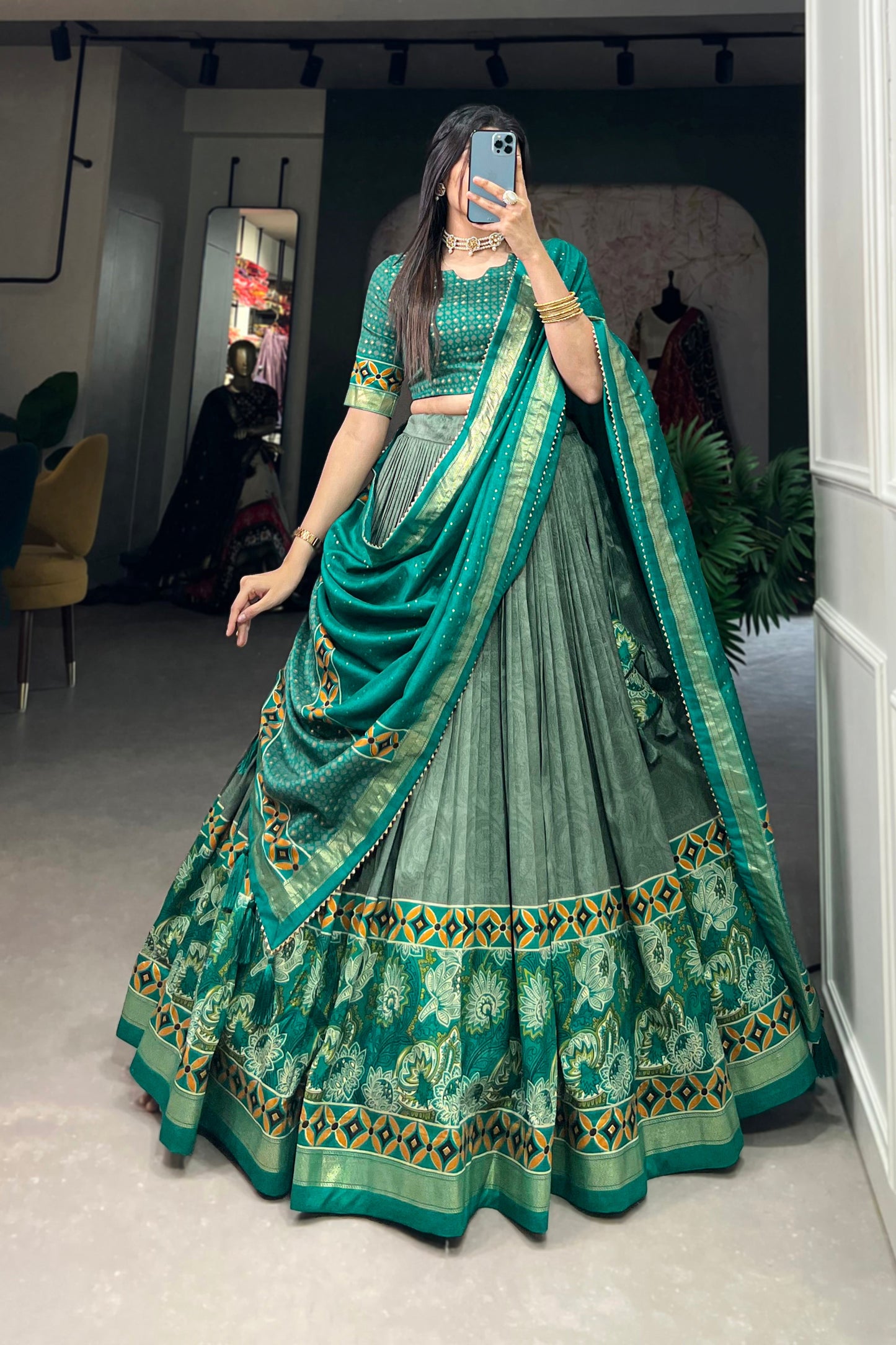 Dark green lehenga front view with printed foil detailing