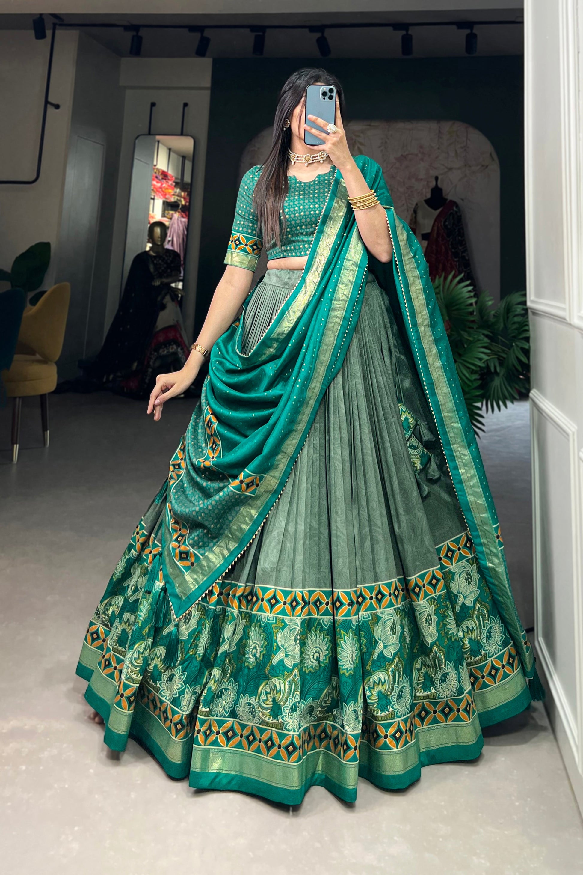 Dark green lehenga front view with printed foil detailing