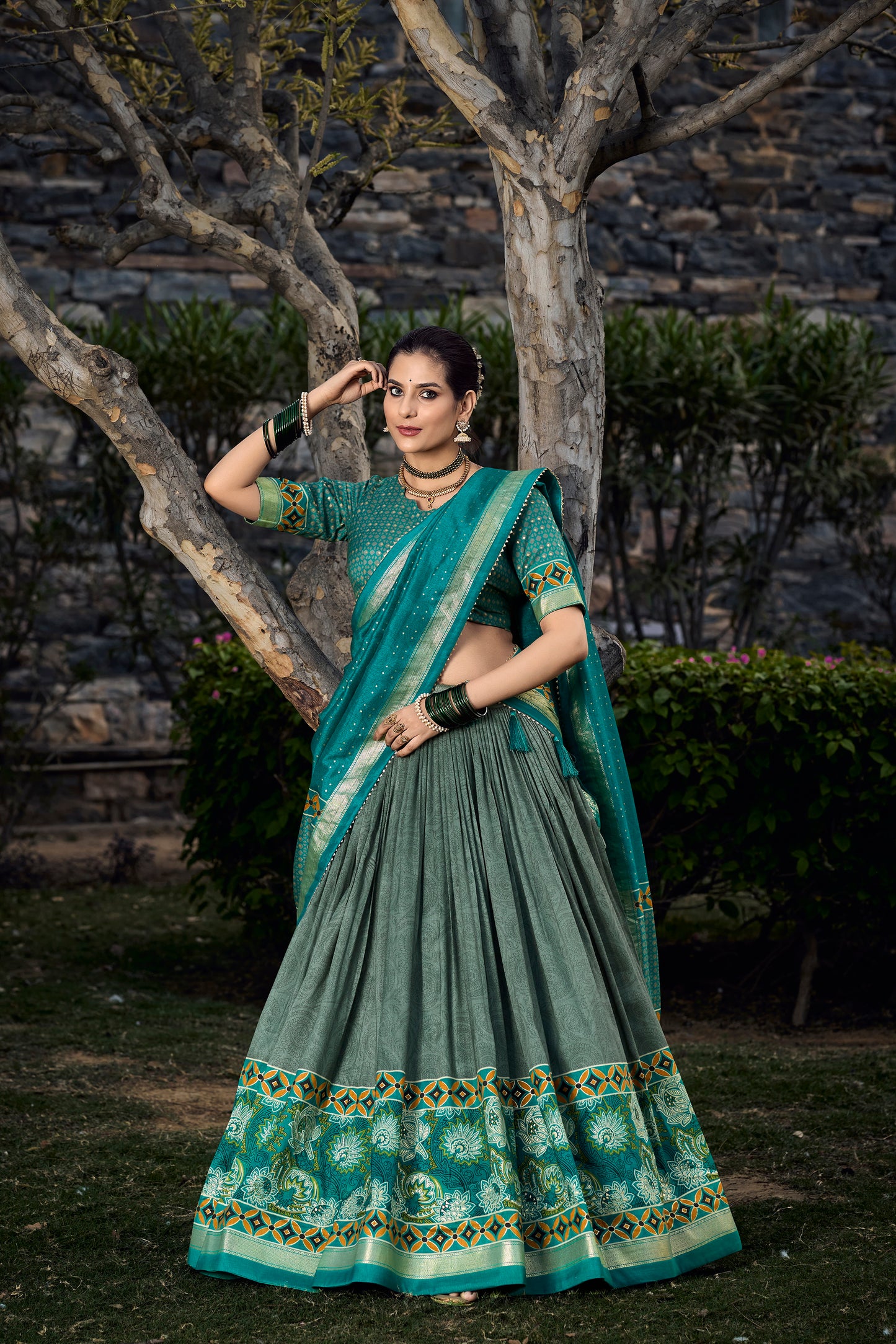 Dark green lehenga styled for Navratri occasion