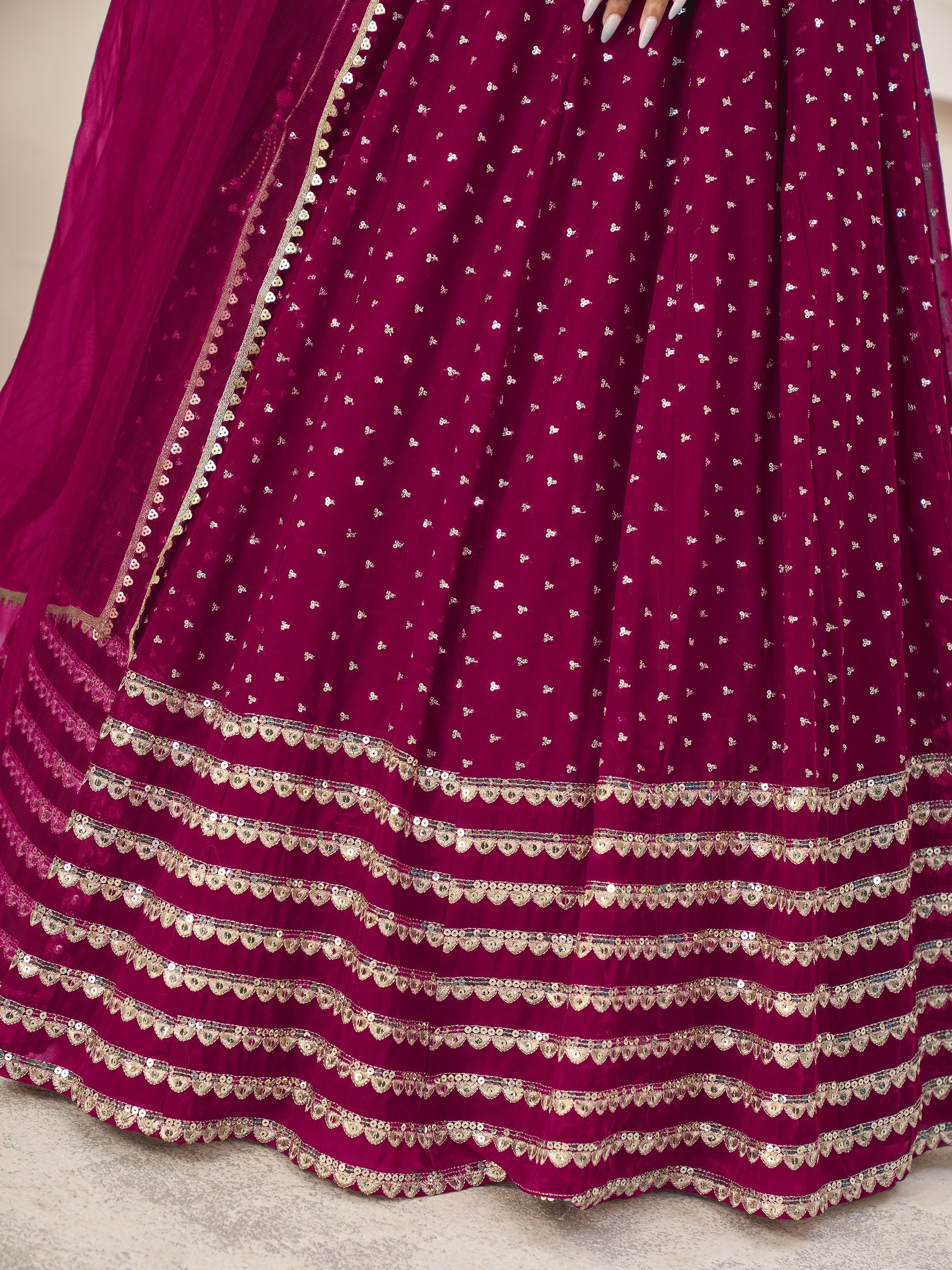 Elegant festive look in dark pink lehenga choli