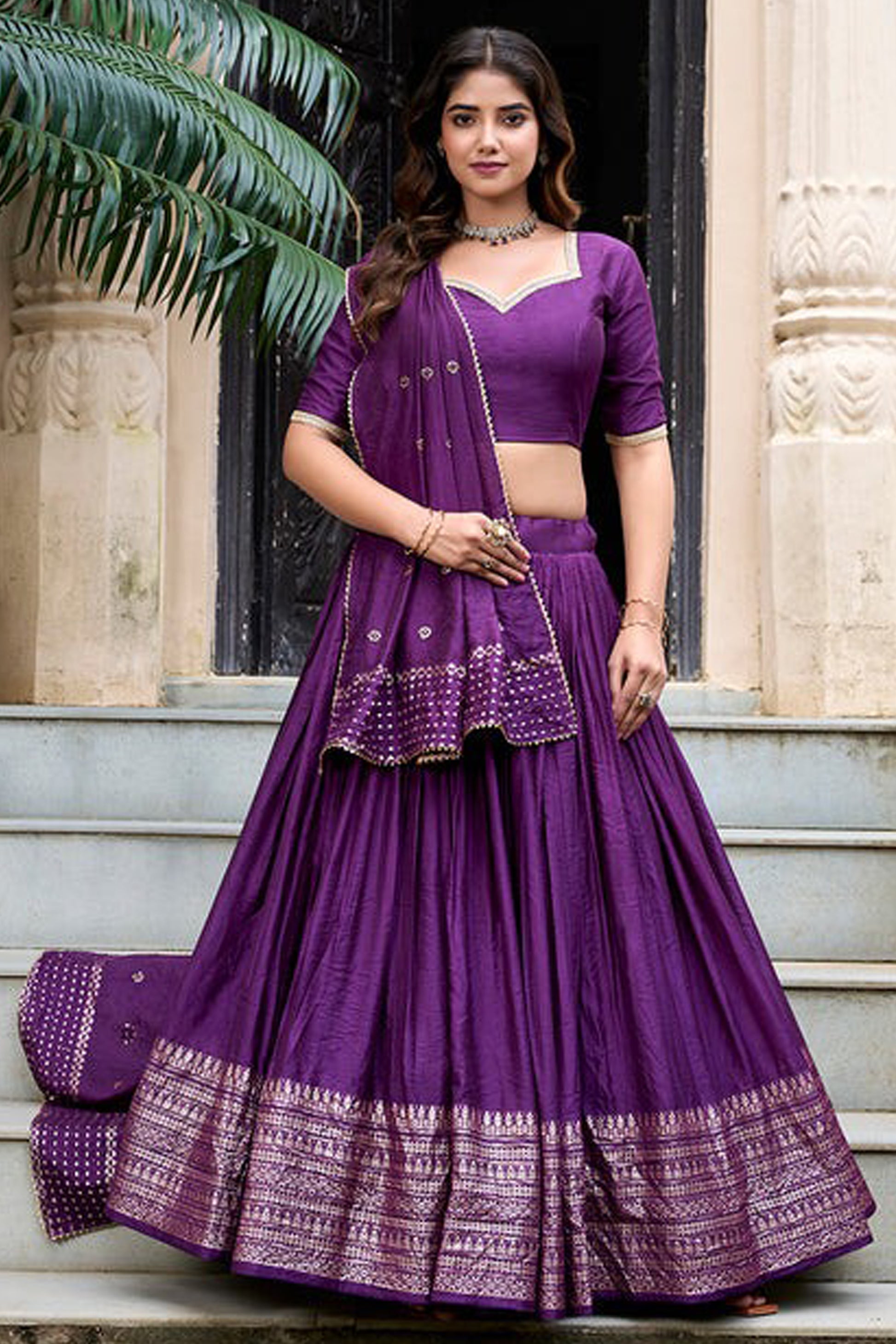 Dark purple lehenga front view with zari weaving work