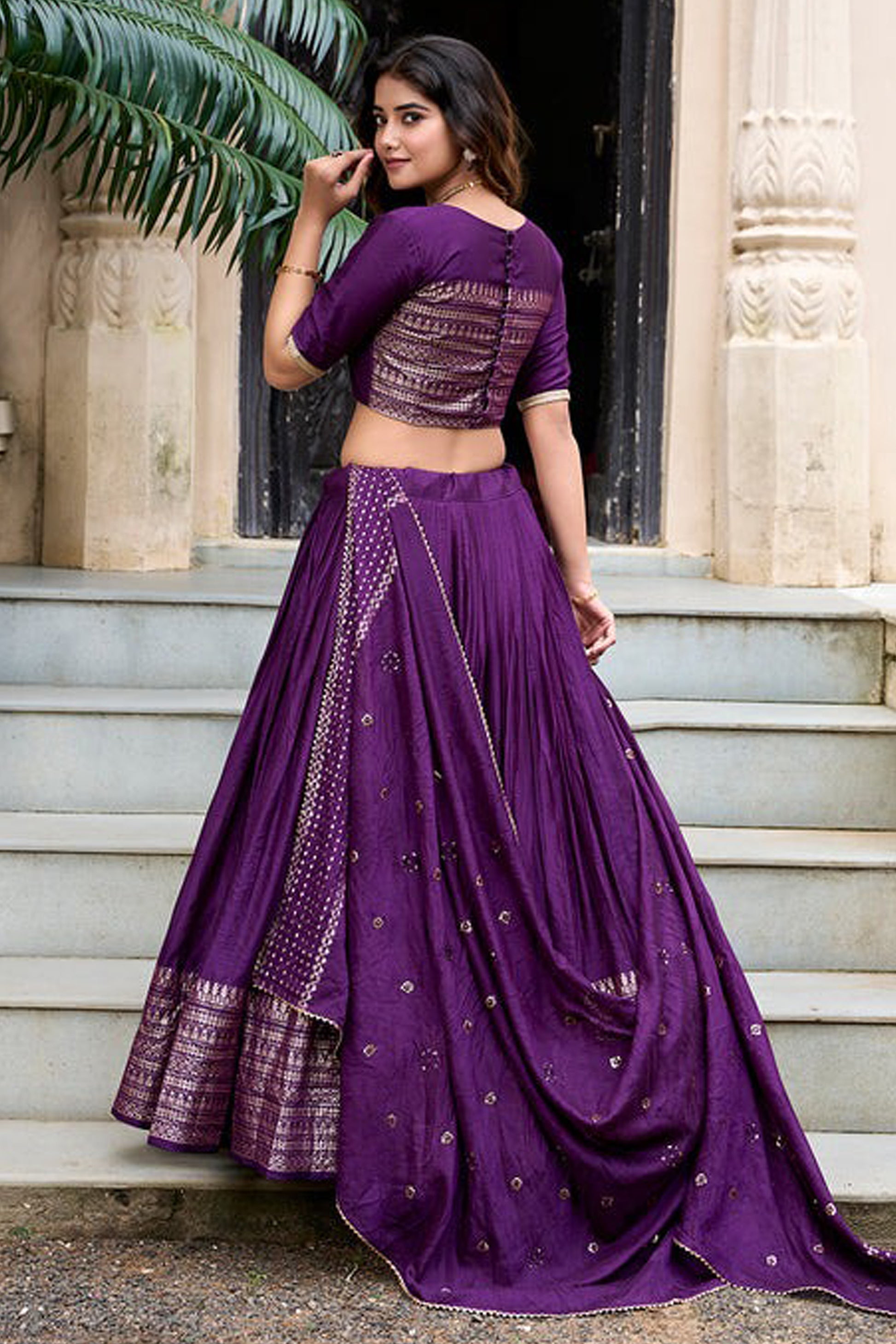 Engagement-ready dark purple lehenga styling view