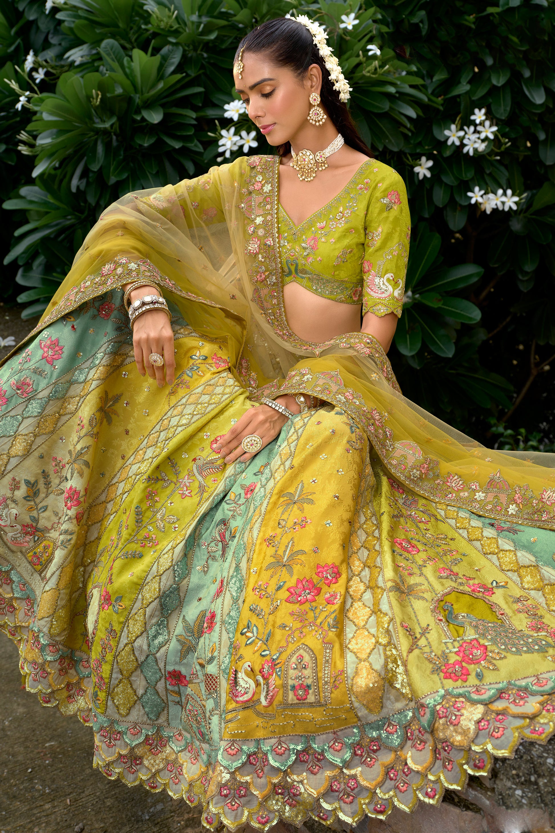 Yellow lehenga back view showing detailed craftsmanship