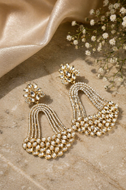 premium gold earrings styled for evening wear