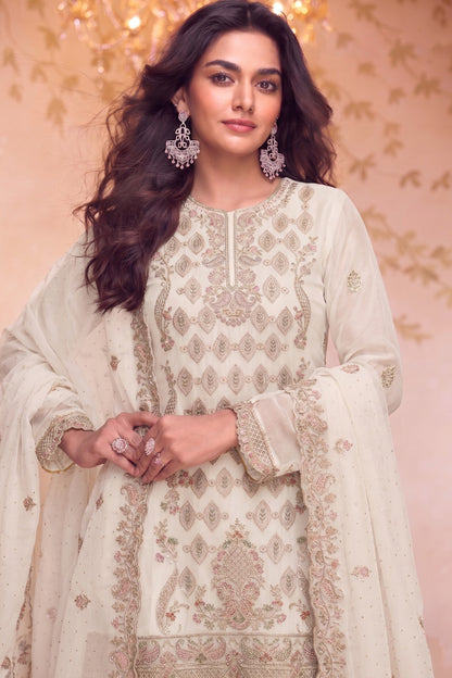 Close detail of Diamond Zarkan work on white silk salwar set