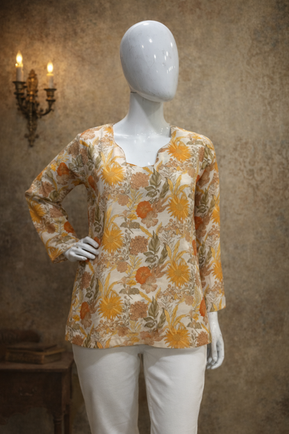 Cream tunic tops for women in natural lighting