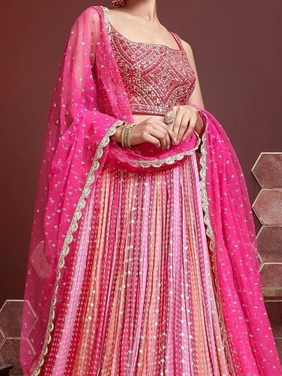 back view of pink cholies with printed lehenga