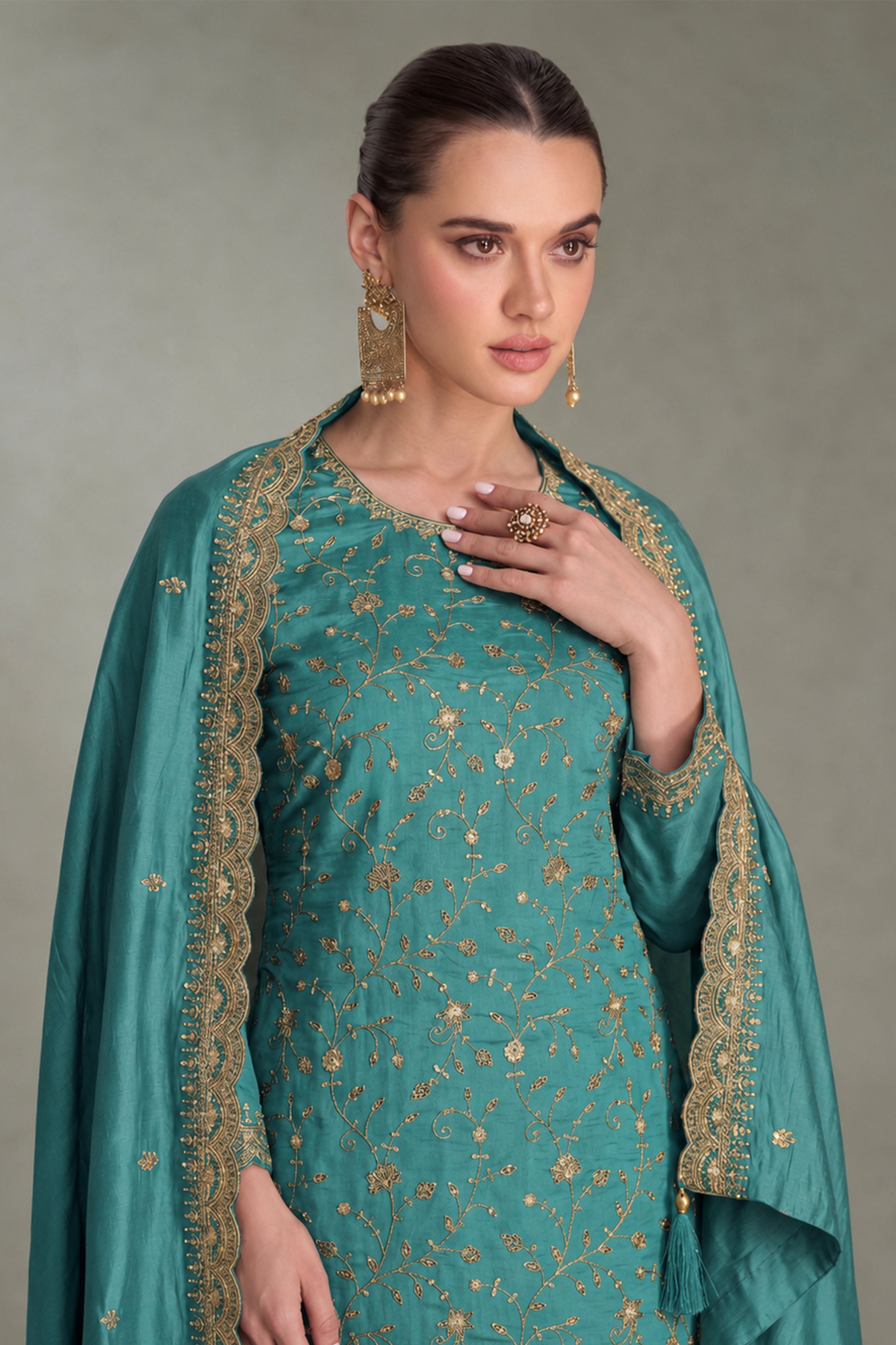 Teal Green Kameez styled for engagement celebrations