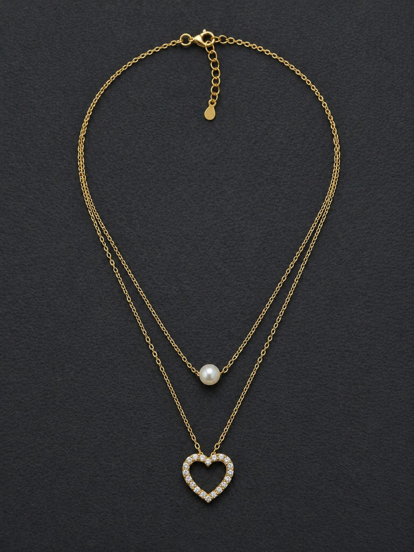 elegant gold necklace with pearl drop detail