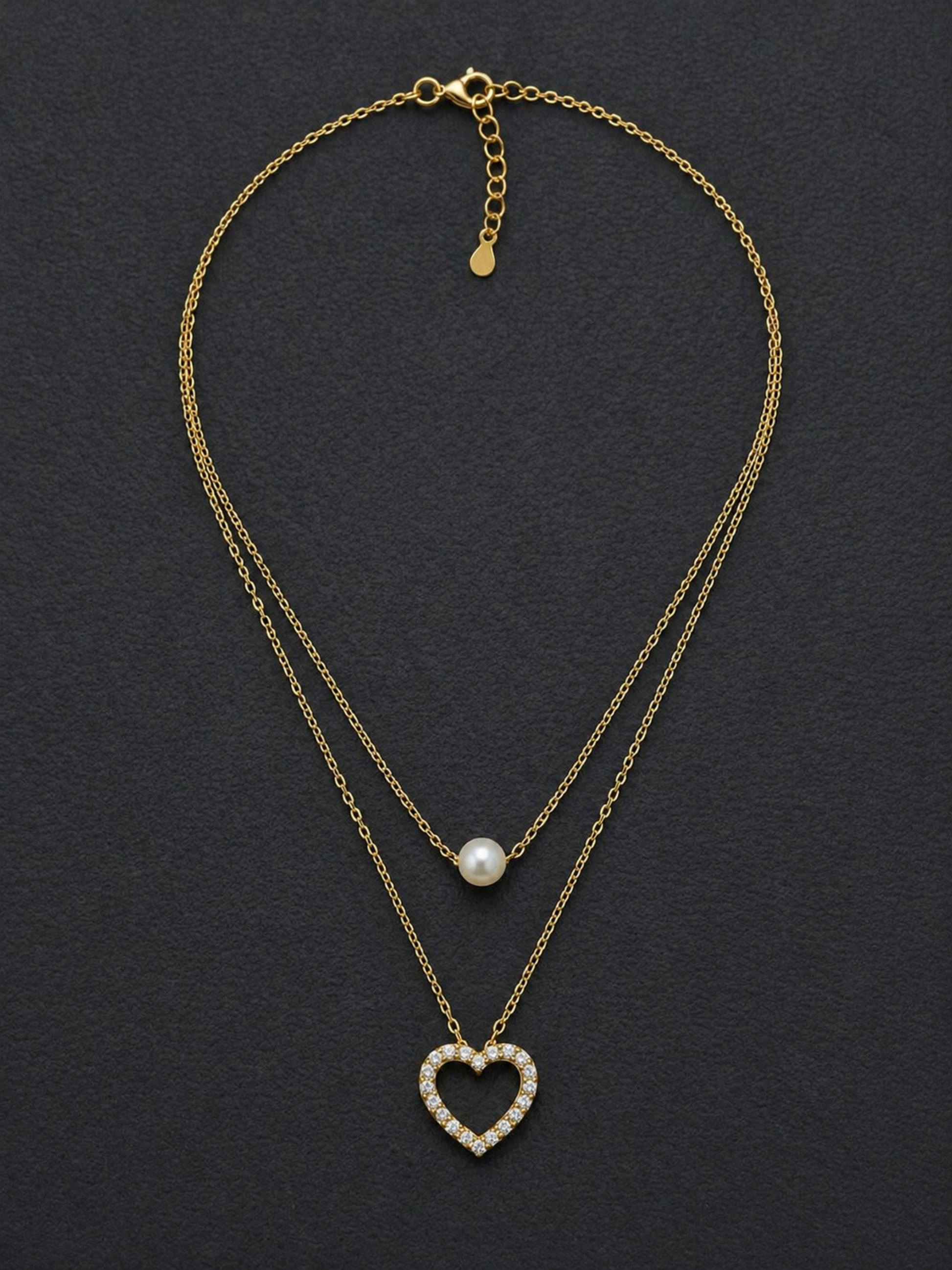 elegant gold necklace with pearl drop detail