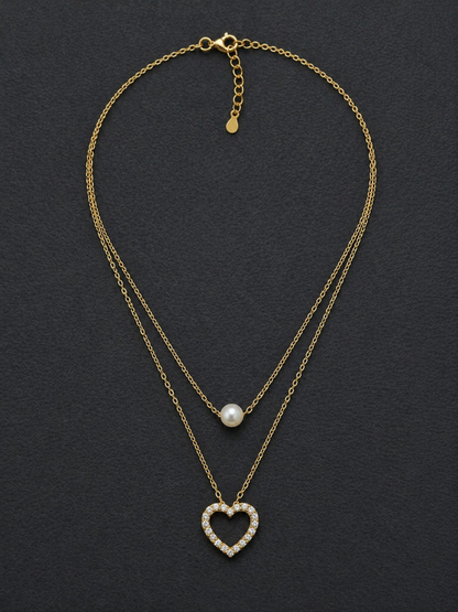 elegant gold necklace with pearl drop detail