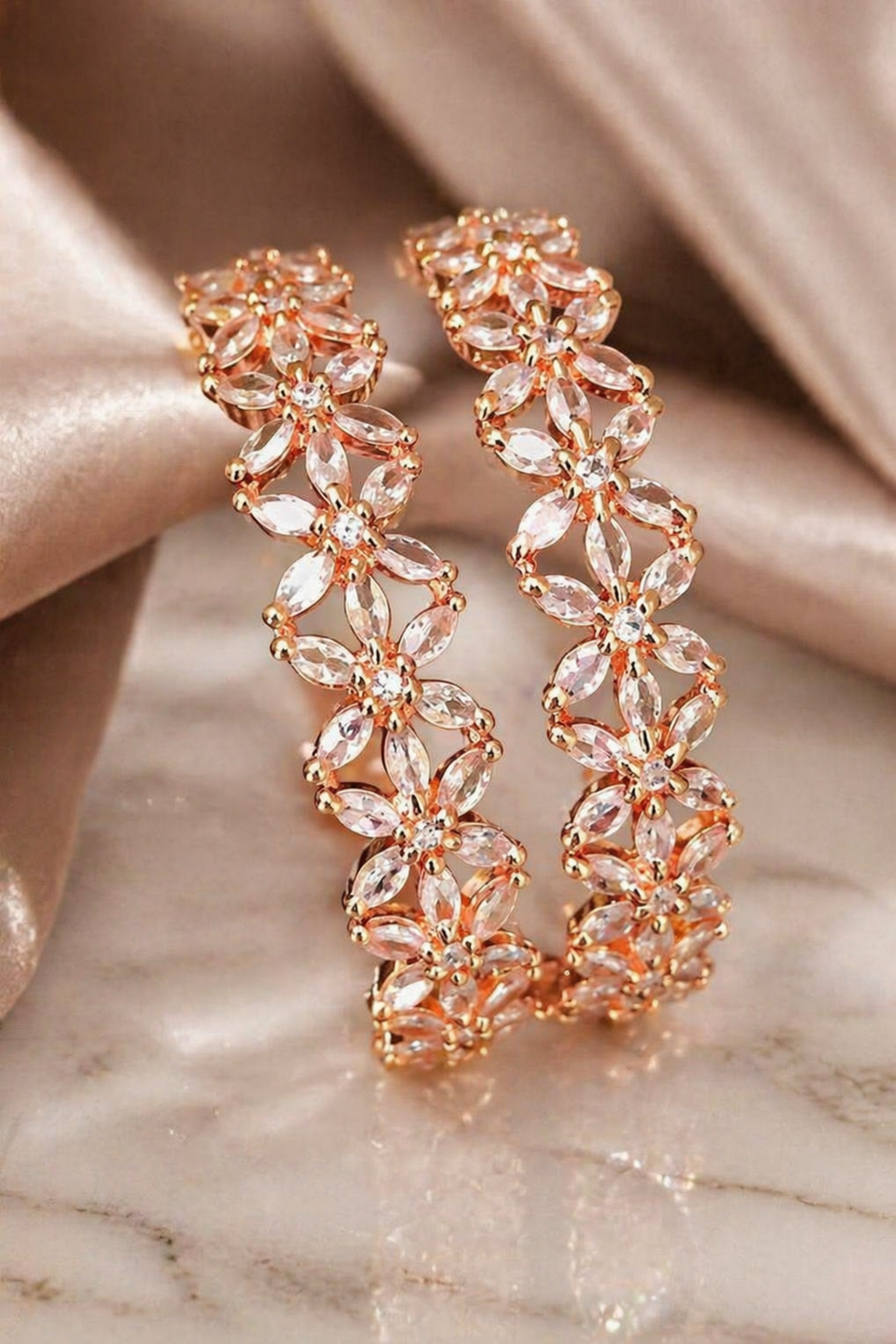 dual floral bangles with polished metal finish