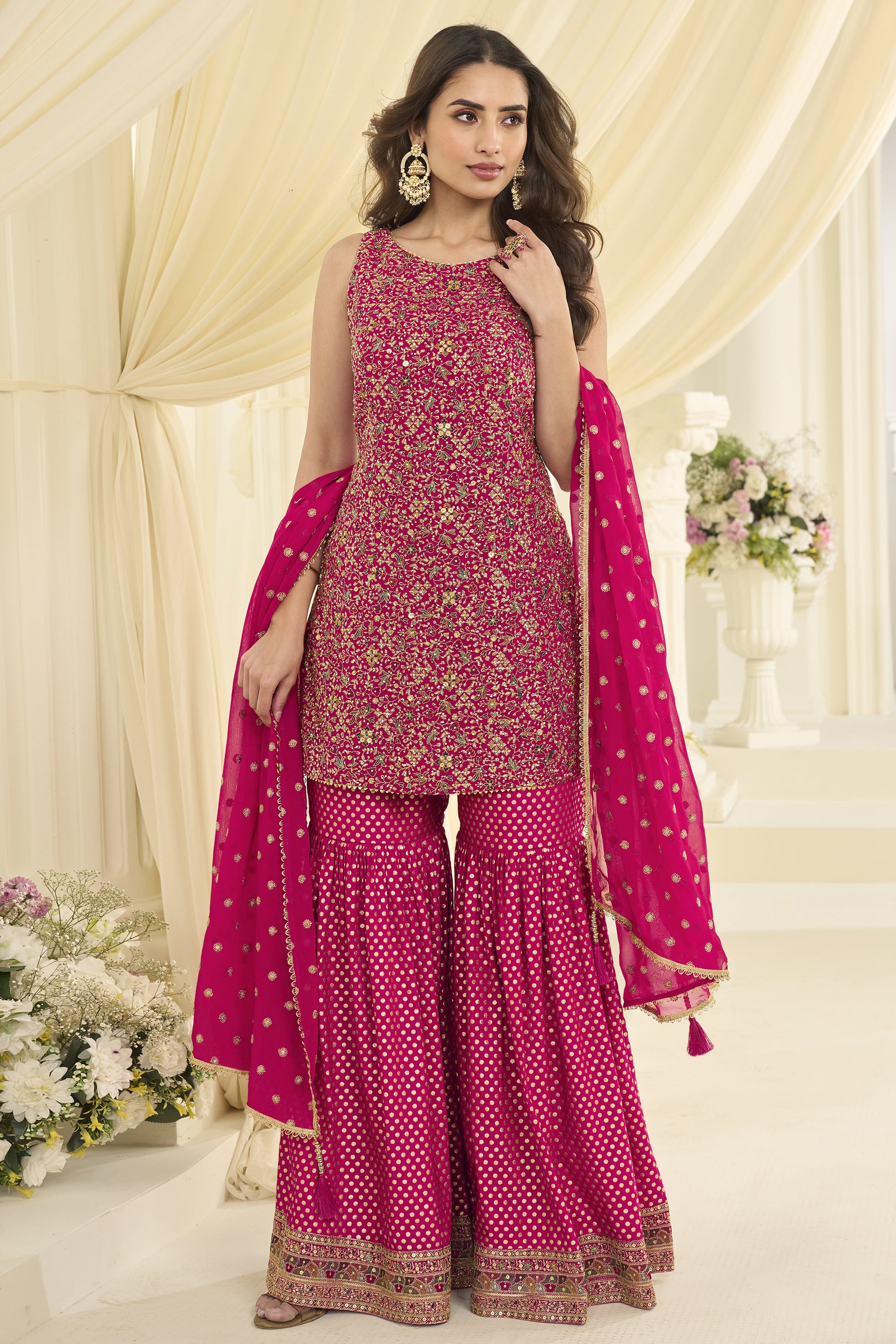 Dusky pink sharara suit front view with embroidered kameez
