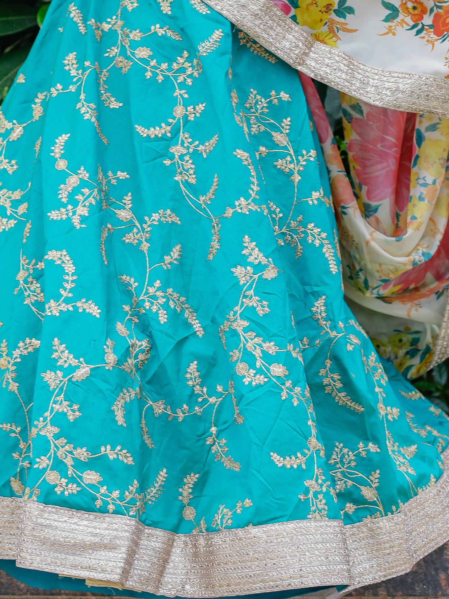 Cyan lehenga choli styled for evening reception look