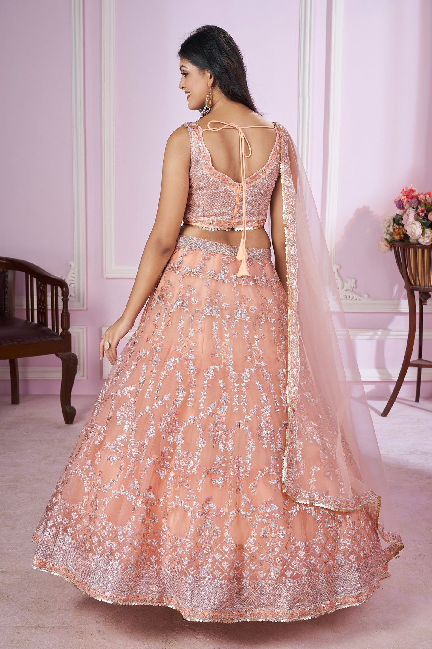 Movement shot showing drape of georgette lehenga fabric
