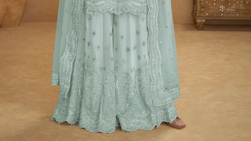 Flowing plazzo pants detail in mint blue suit