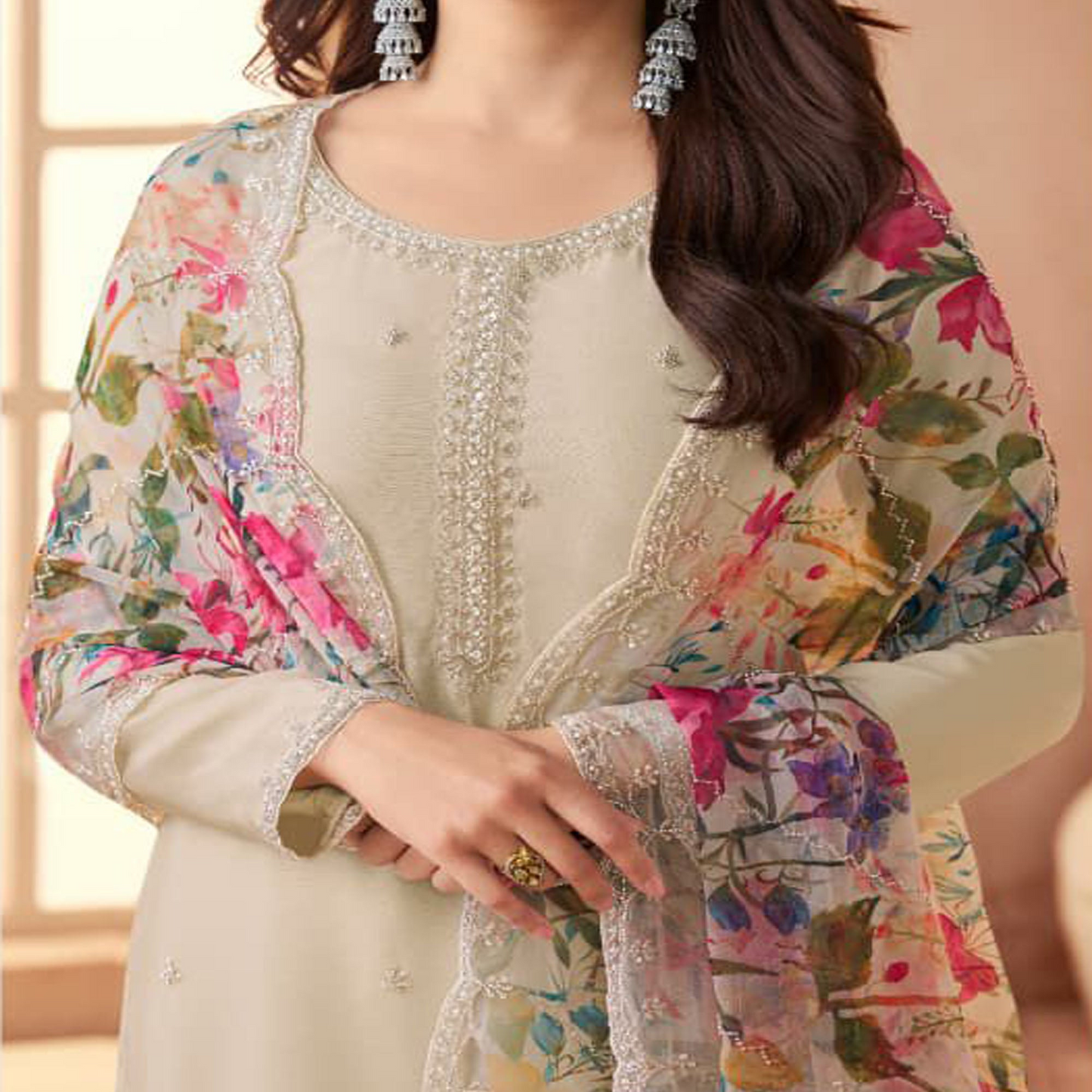 Embroidered neckline detail of beige salwar suit
