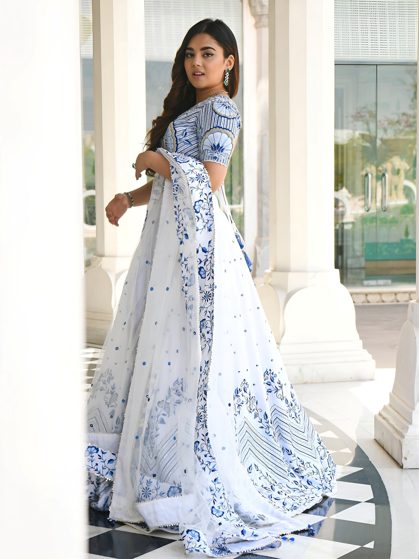 Designer white lehenga outfit with thread work accents