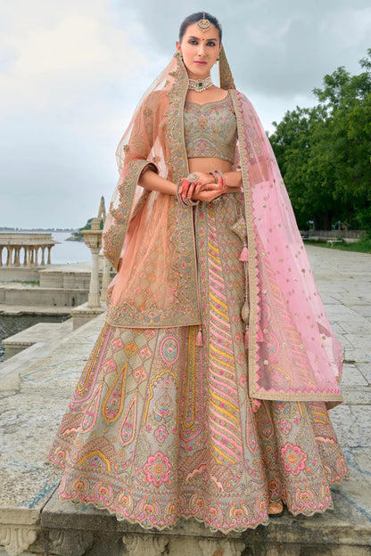 Close-up of sequins work on silk peach lehenga