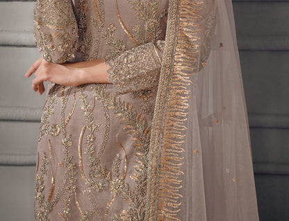 Brown salwar kameez gives a warm, grounded, and earthy feel