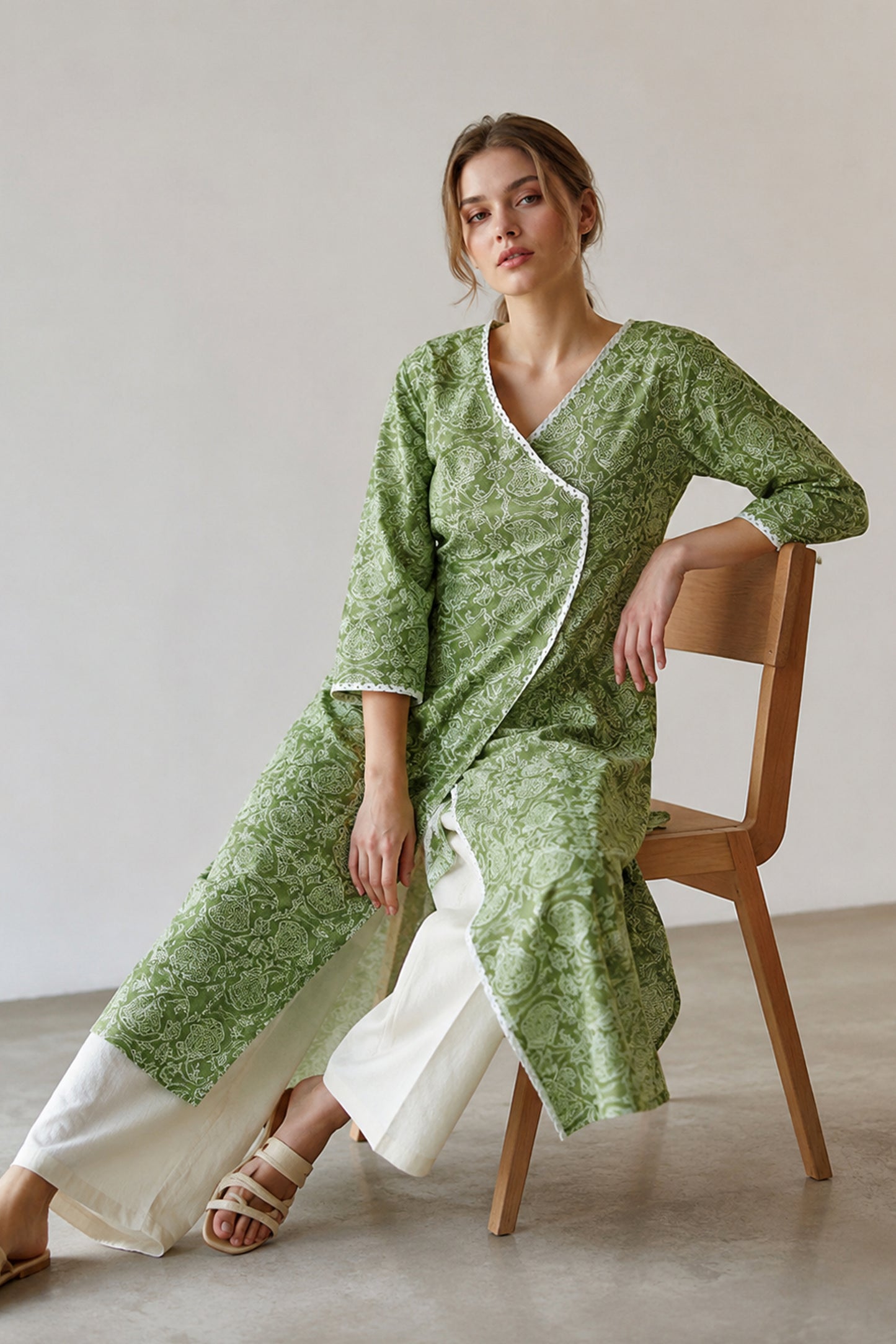 Green everyday wear Anarkali kurti with white straight pants