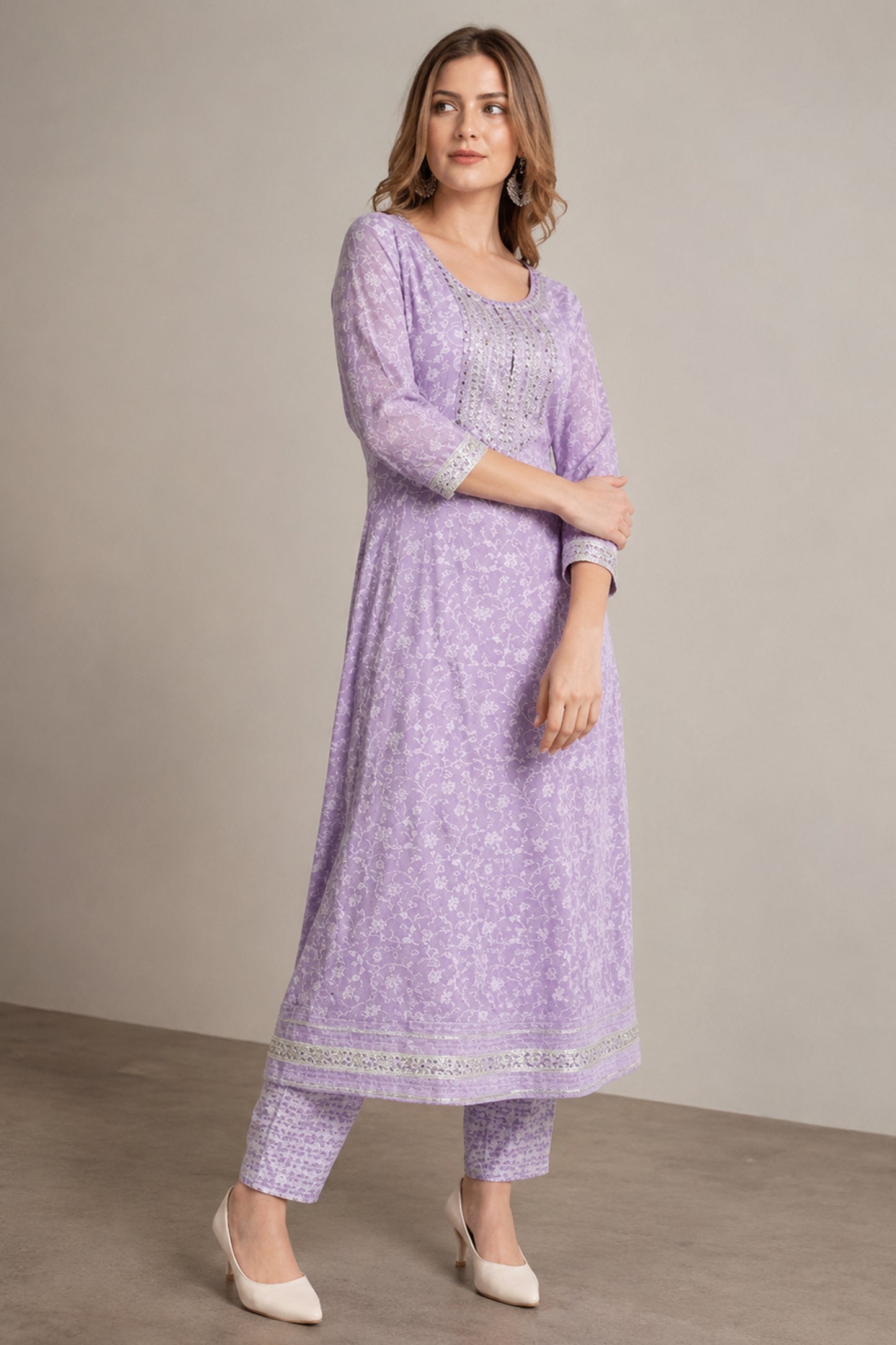Purple embroidered kurti with coordinated straight pants