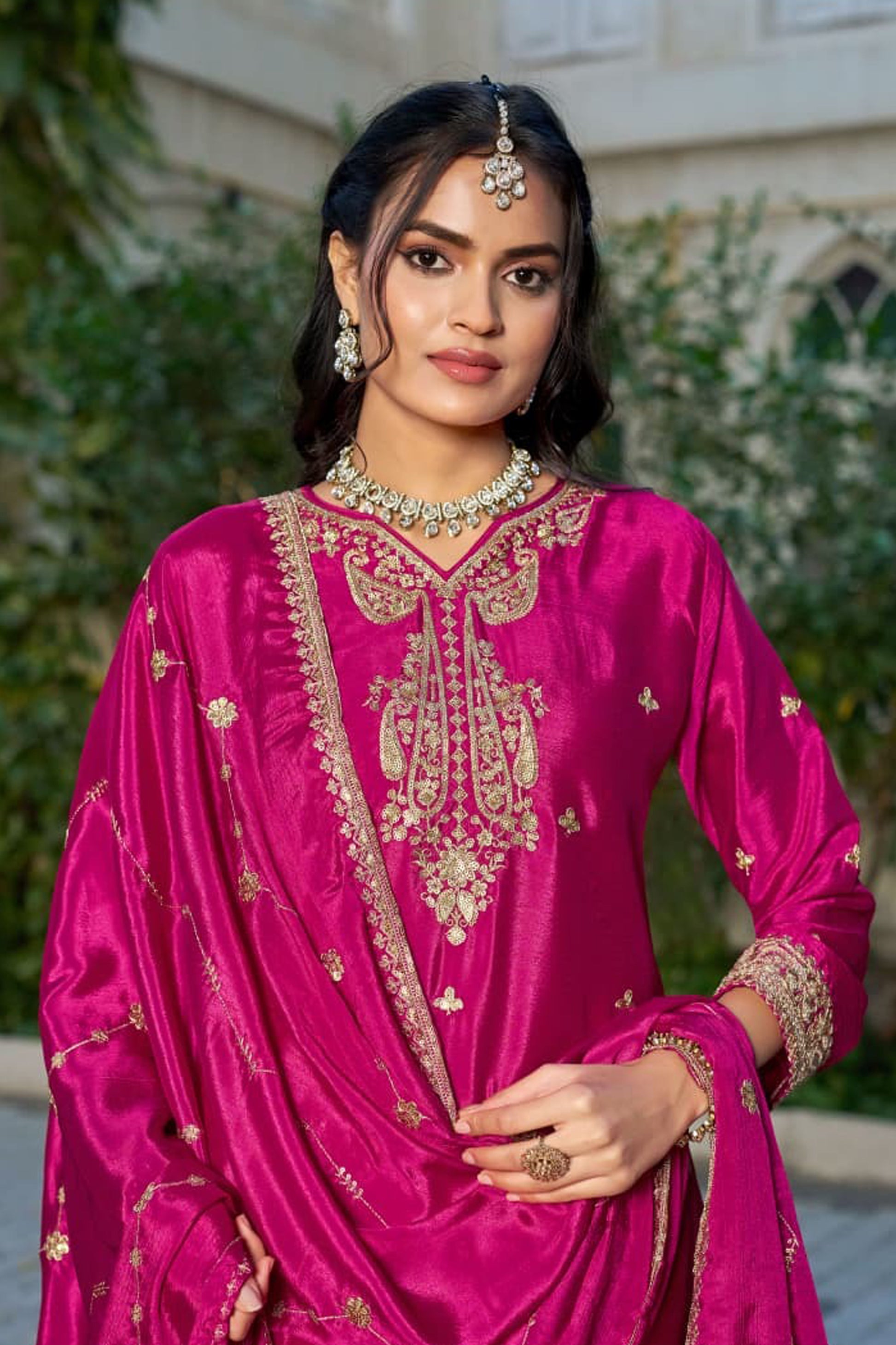 Magenta Pink Palazzo Suit showcased with occasion accessories
