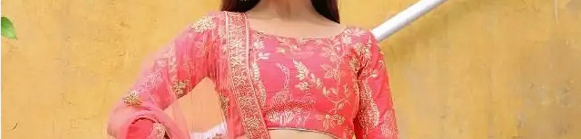 Peach Lehenga Choli styled for wedding guest celebration