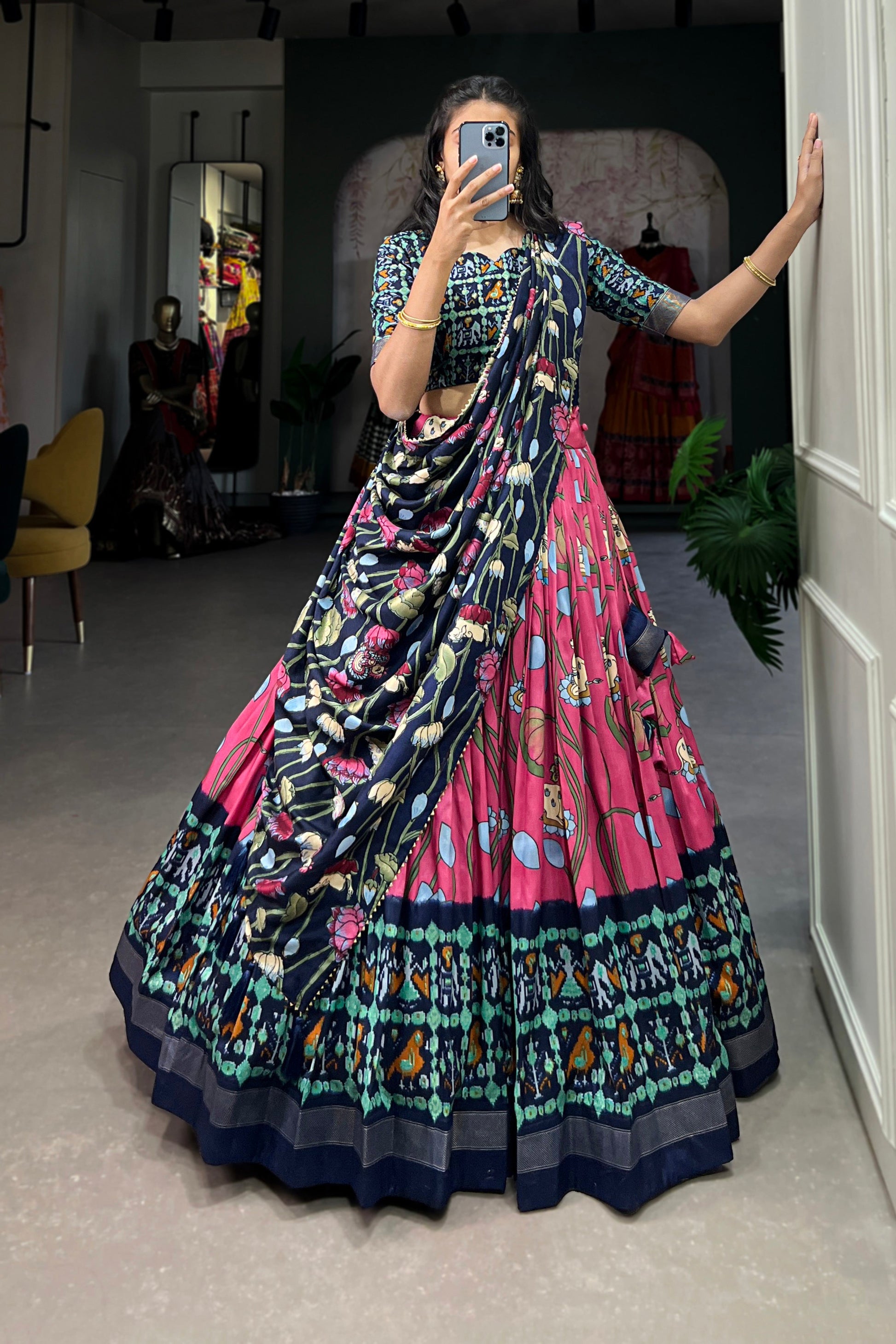 Model wearing hot pink lehenga in reception setting