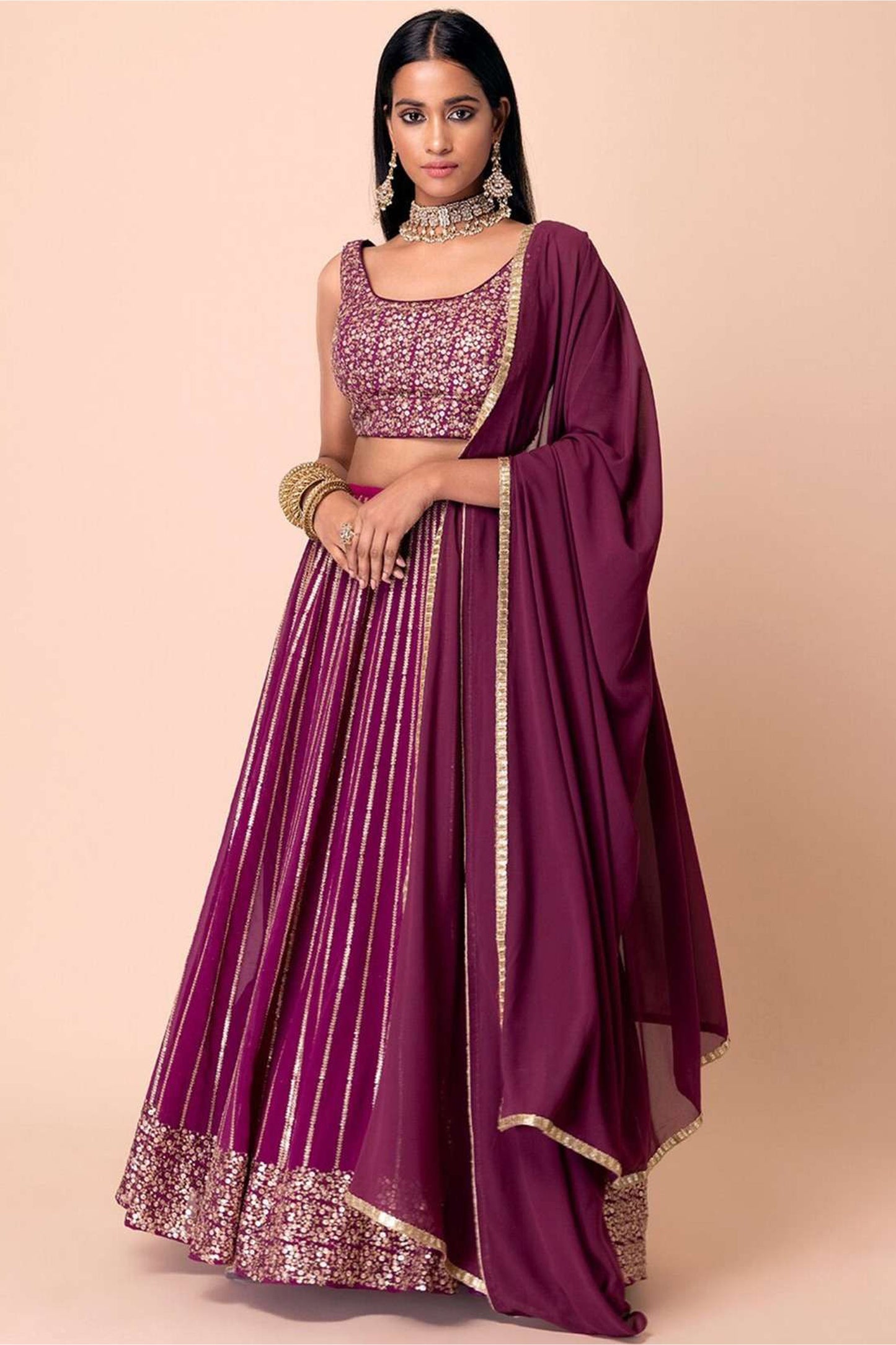 Full outfit display showing lehenga choli set with dupatta flow
