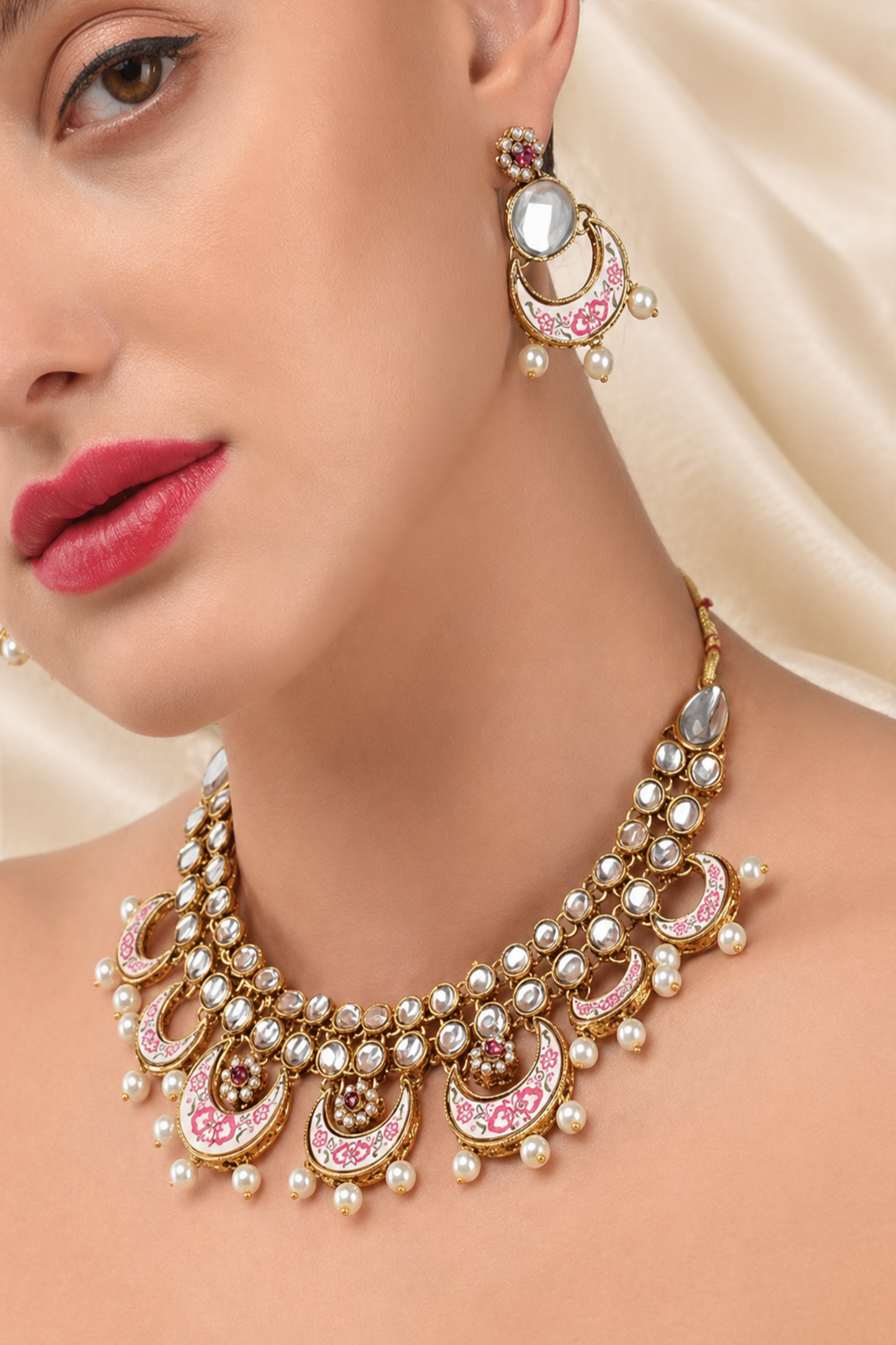 Gold-tone crescent necklace with matching earrings