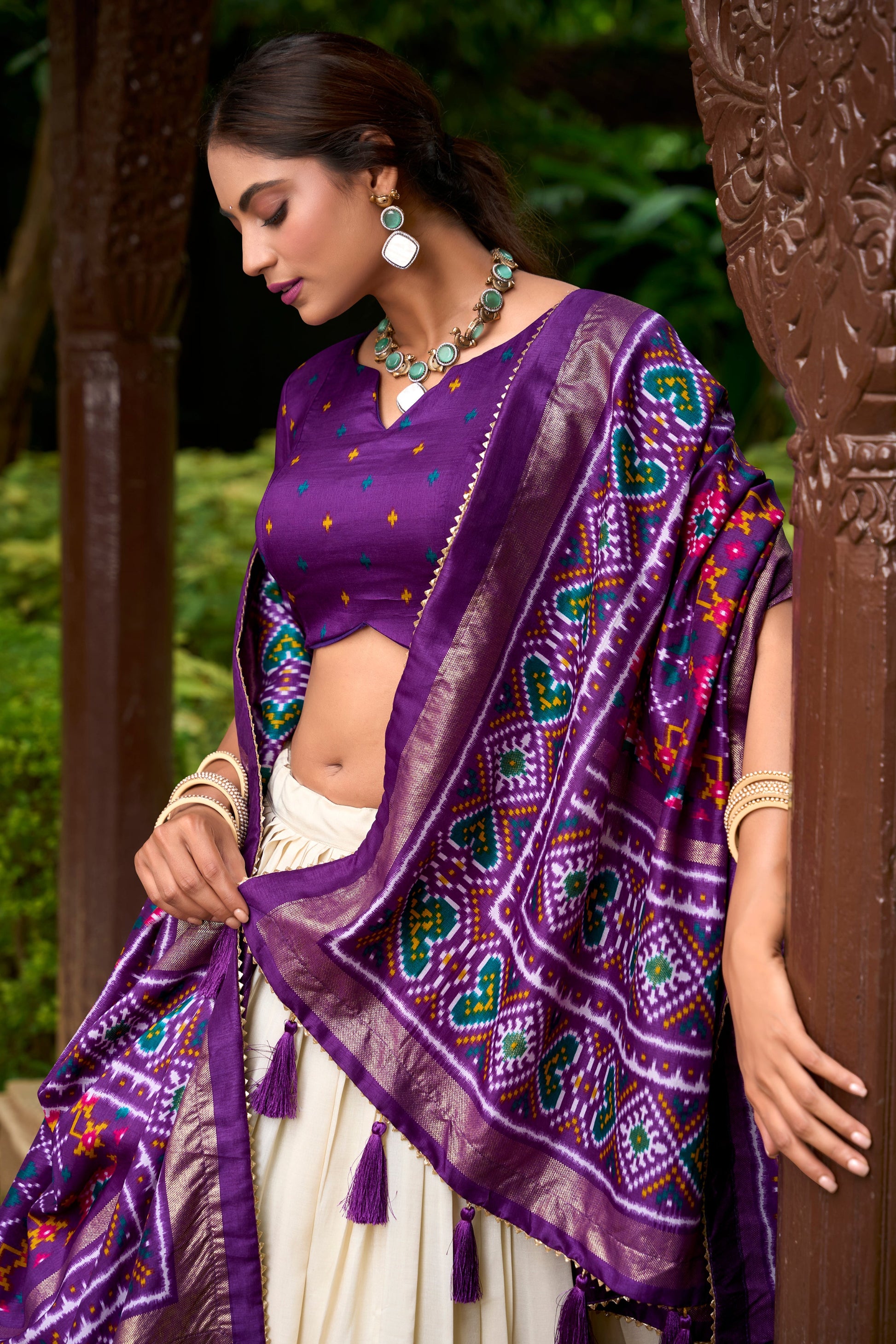Close-up of foil print on purple lehenga fabric