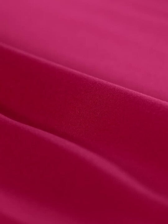 Close-up of satin sheen reflecting natural light