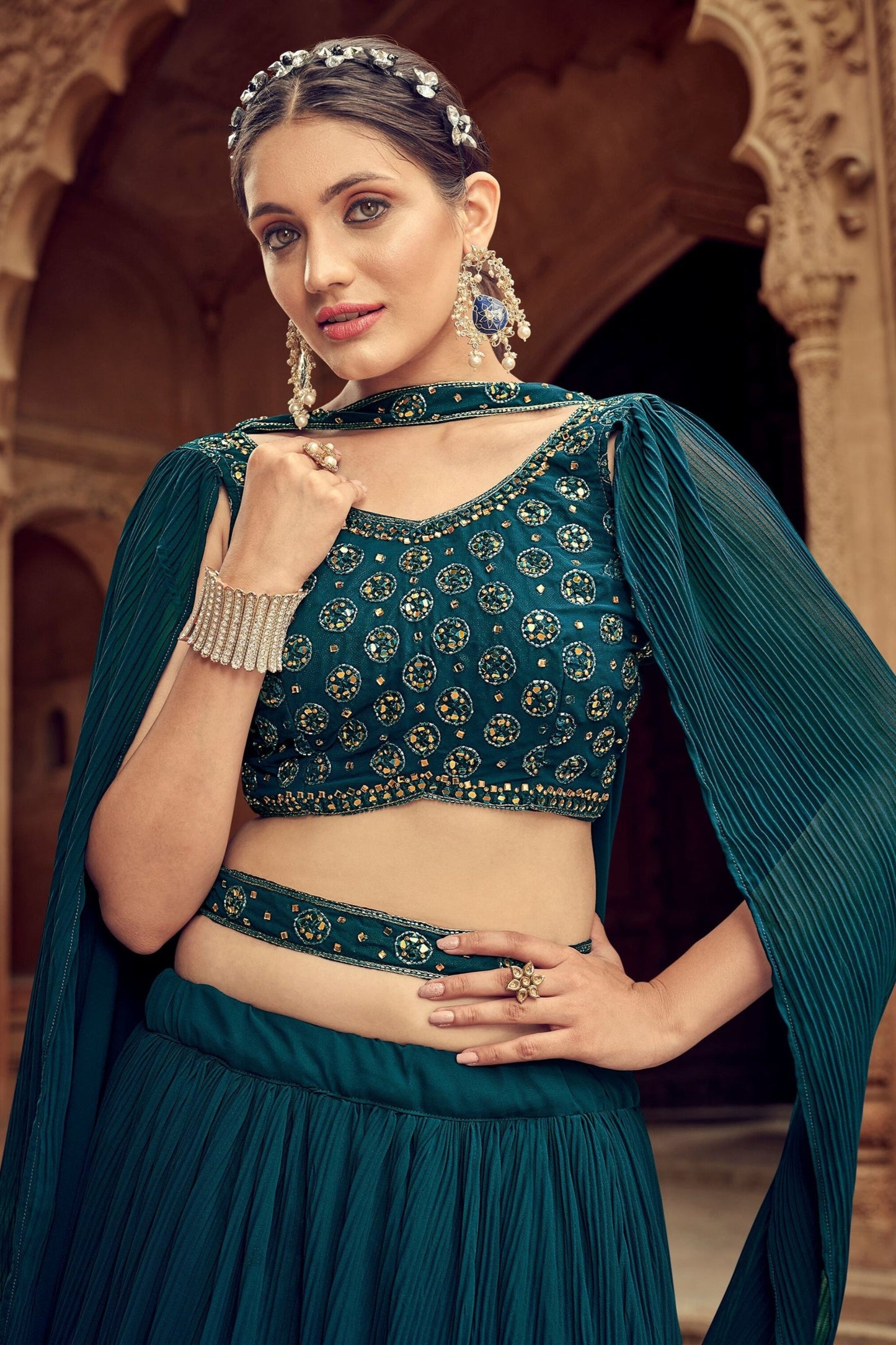 Georgette lehenga choli in dark blue with flowing silhouette