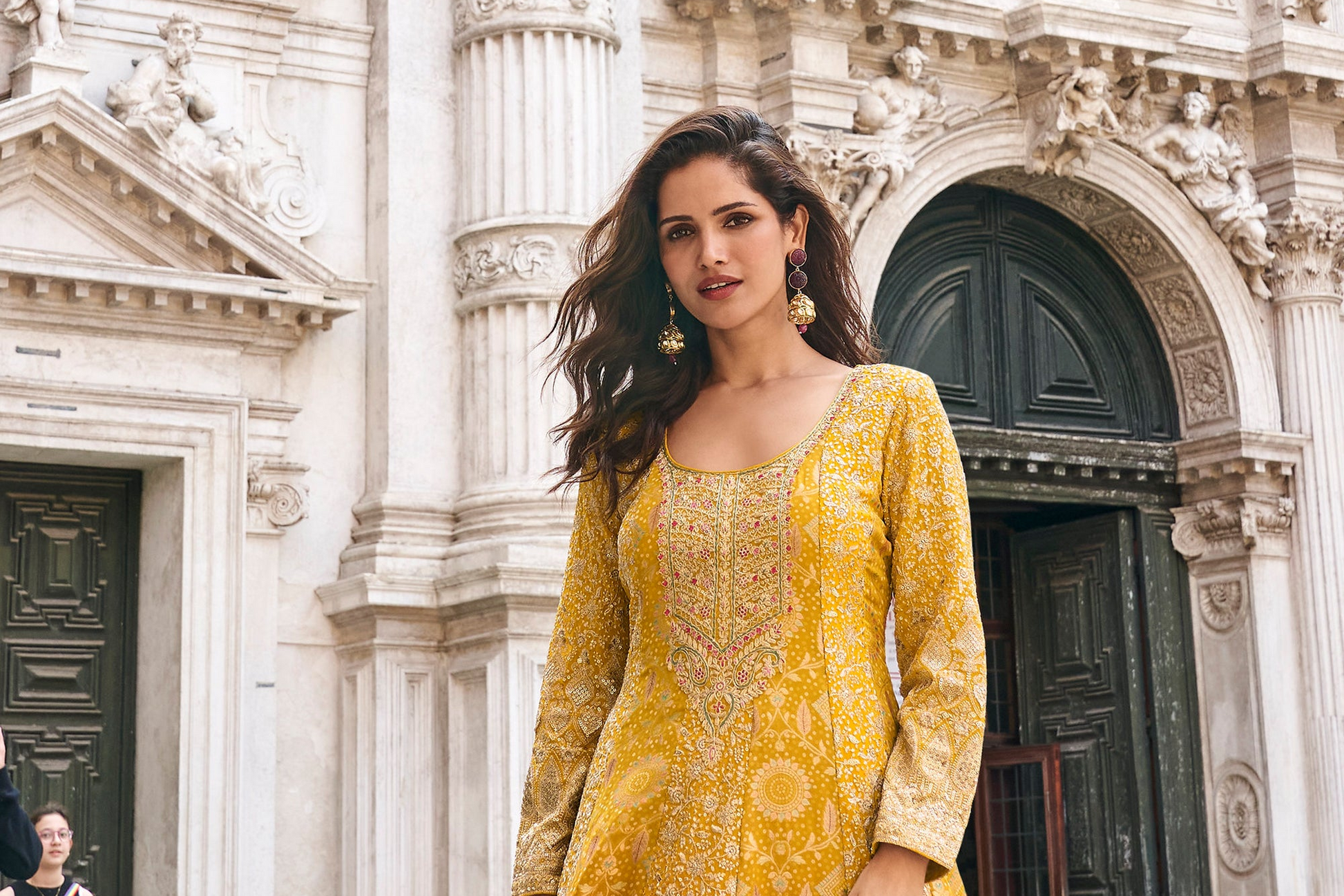 Front view of pink sharara suit set