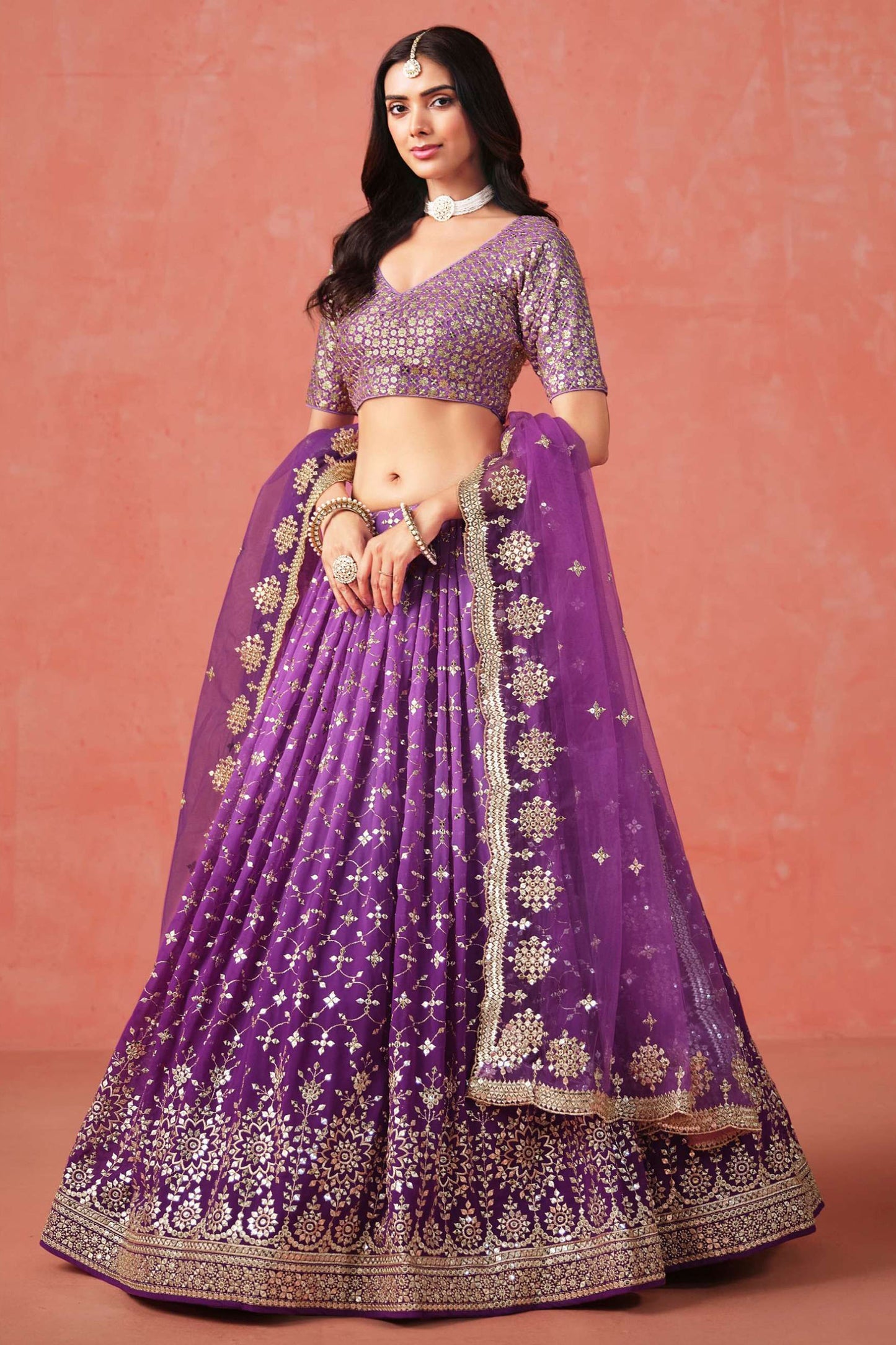 Detailed view of sequins work on purple choli lehenga choli