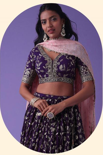 Purple lehenga choli showcasing zari and sequins work