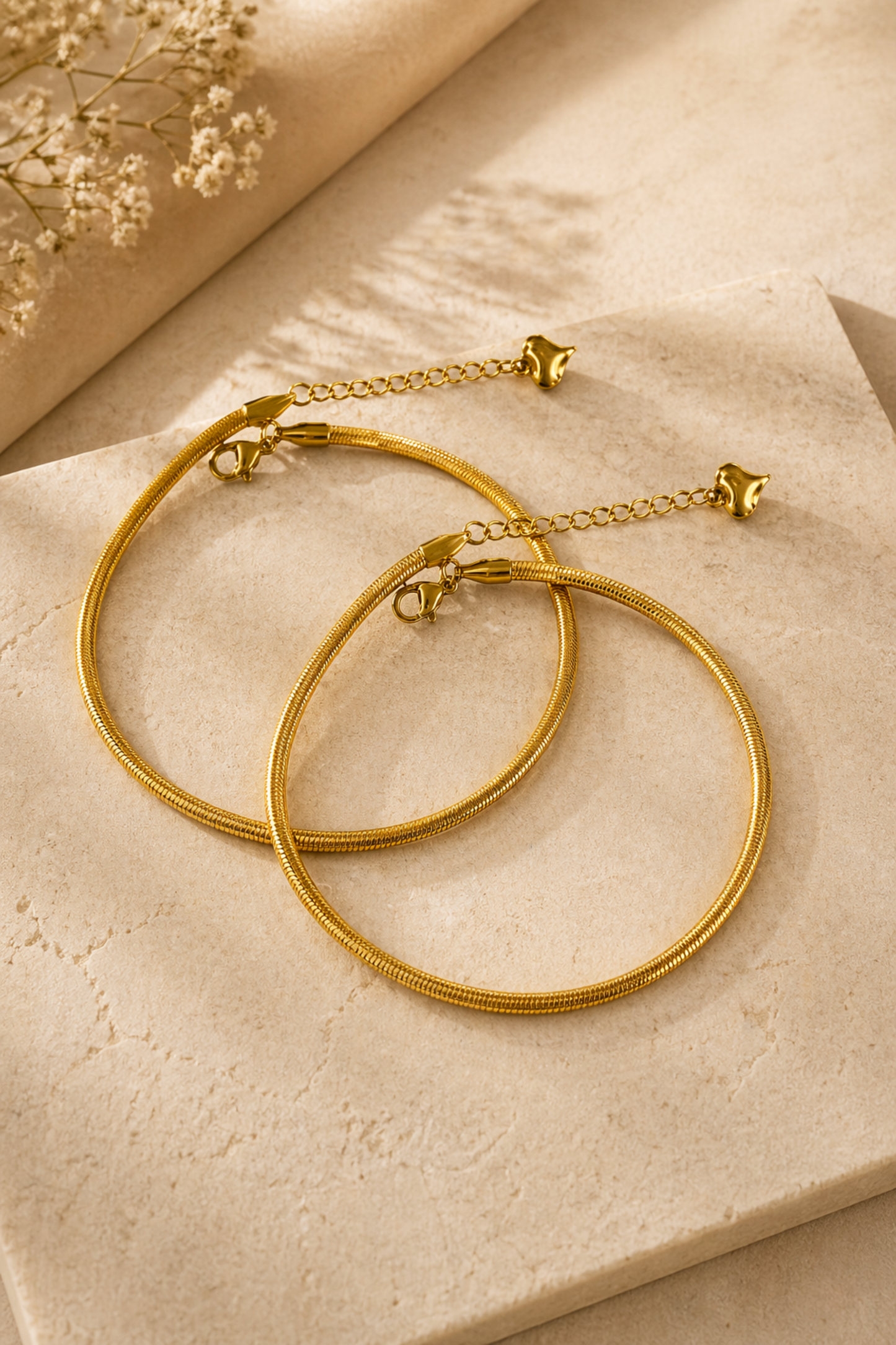 minimal gold anklet close-up
