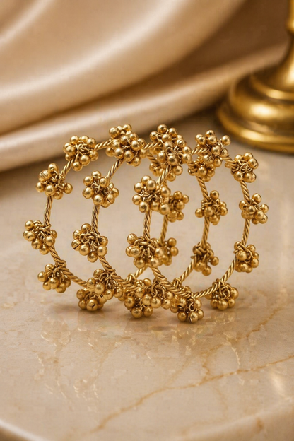 gold tone bracelet with clustered bead charms