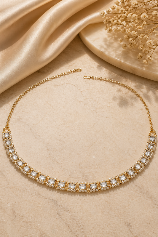 gold waist chain with clear square stones and pearl edges
