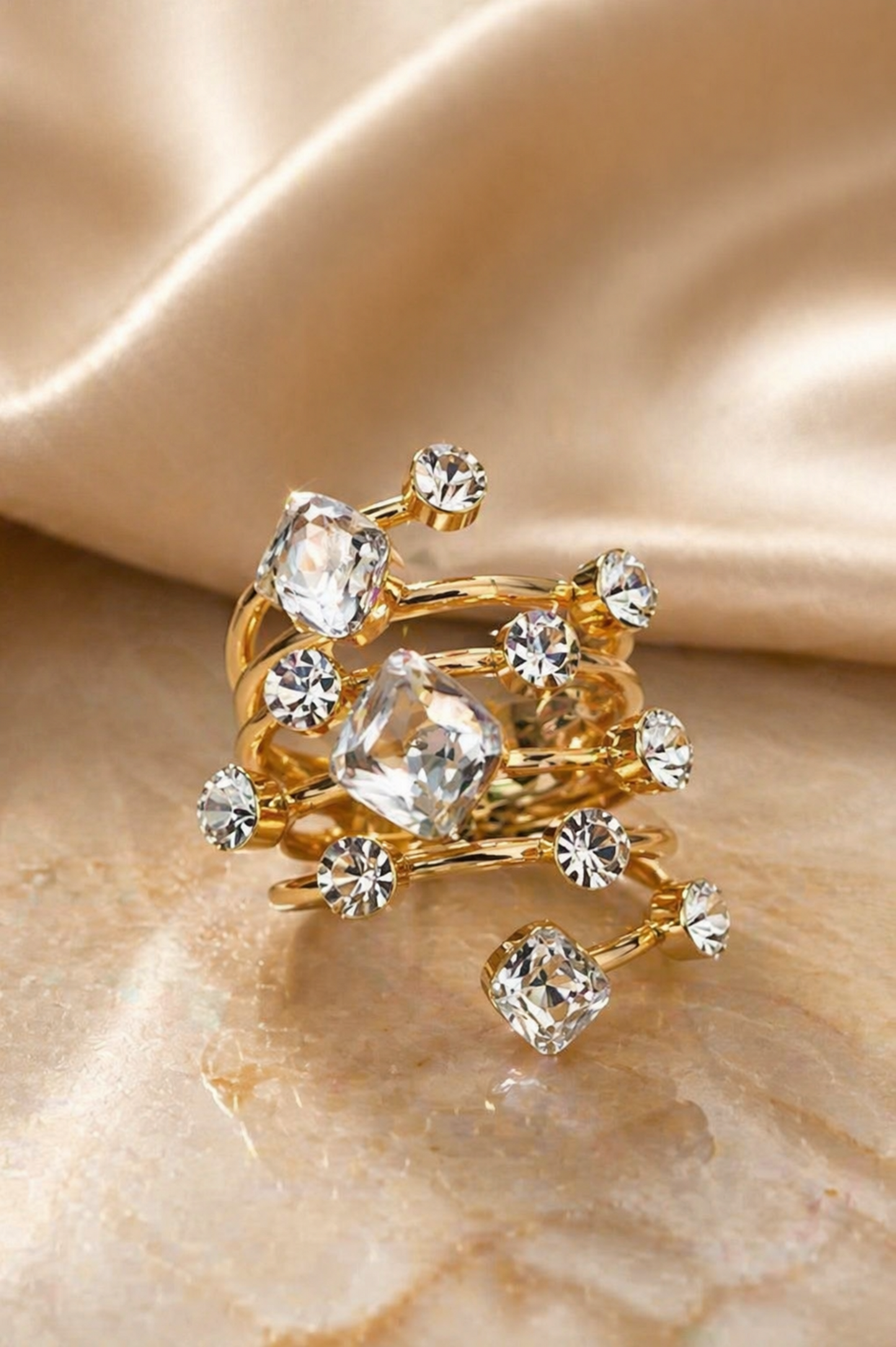 designer gold wrap ring with multiple stones