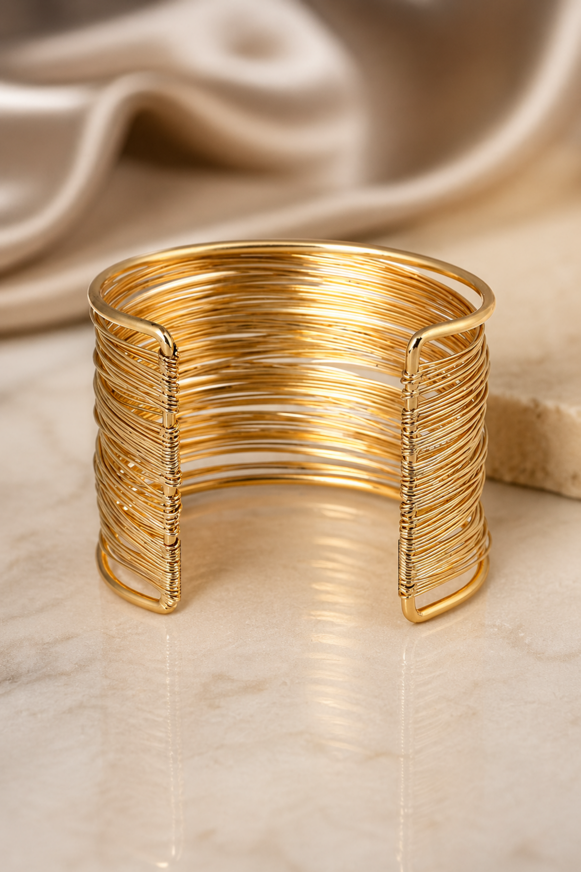 wide gold cuff bracelet with layered wire design