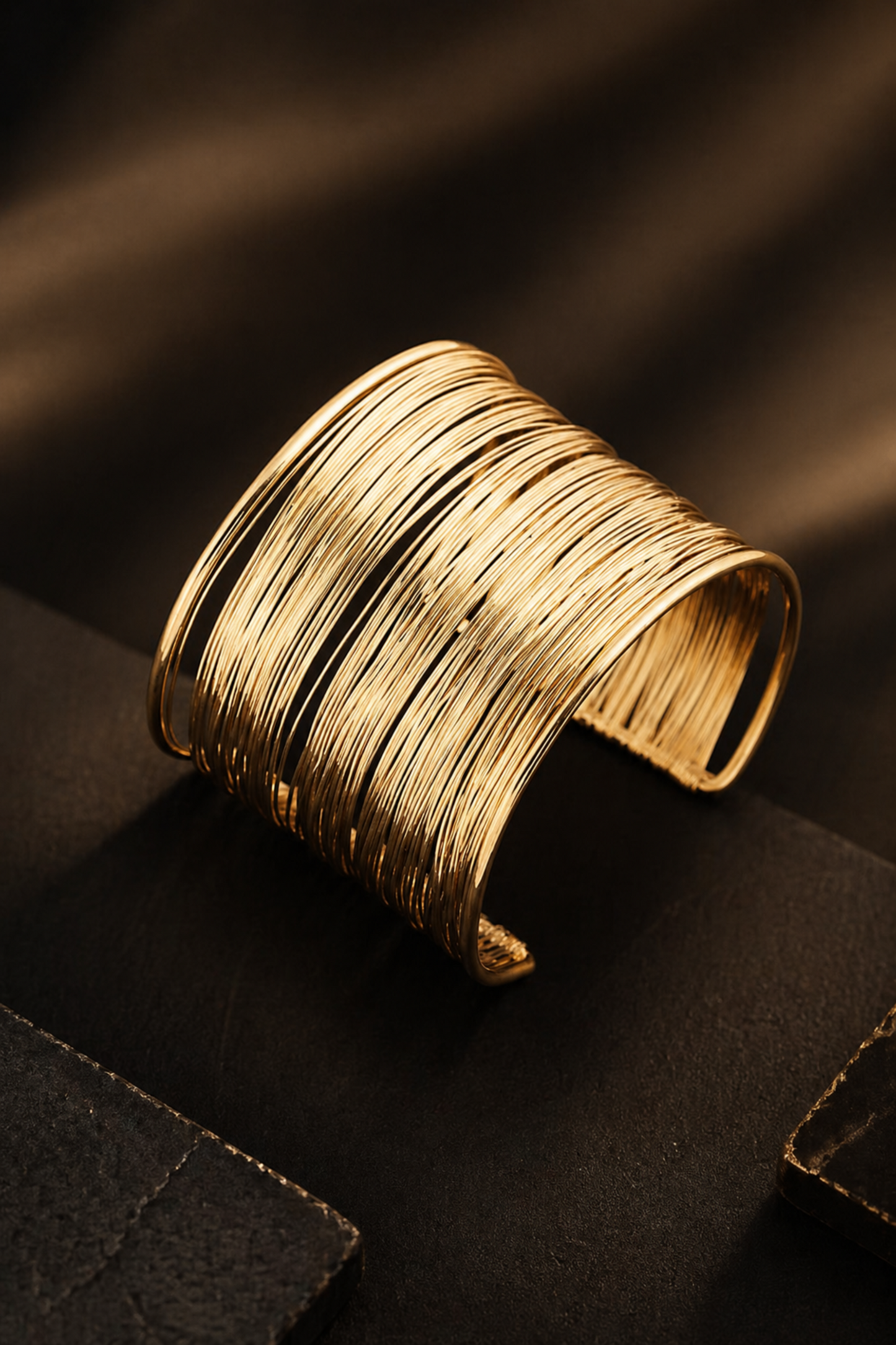 gold cuff bracelet styled in natural sunlight