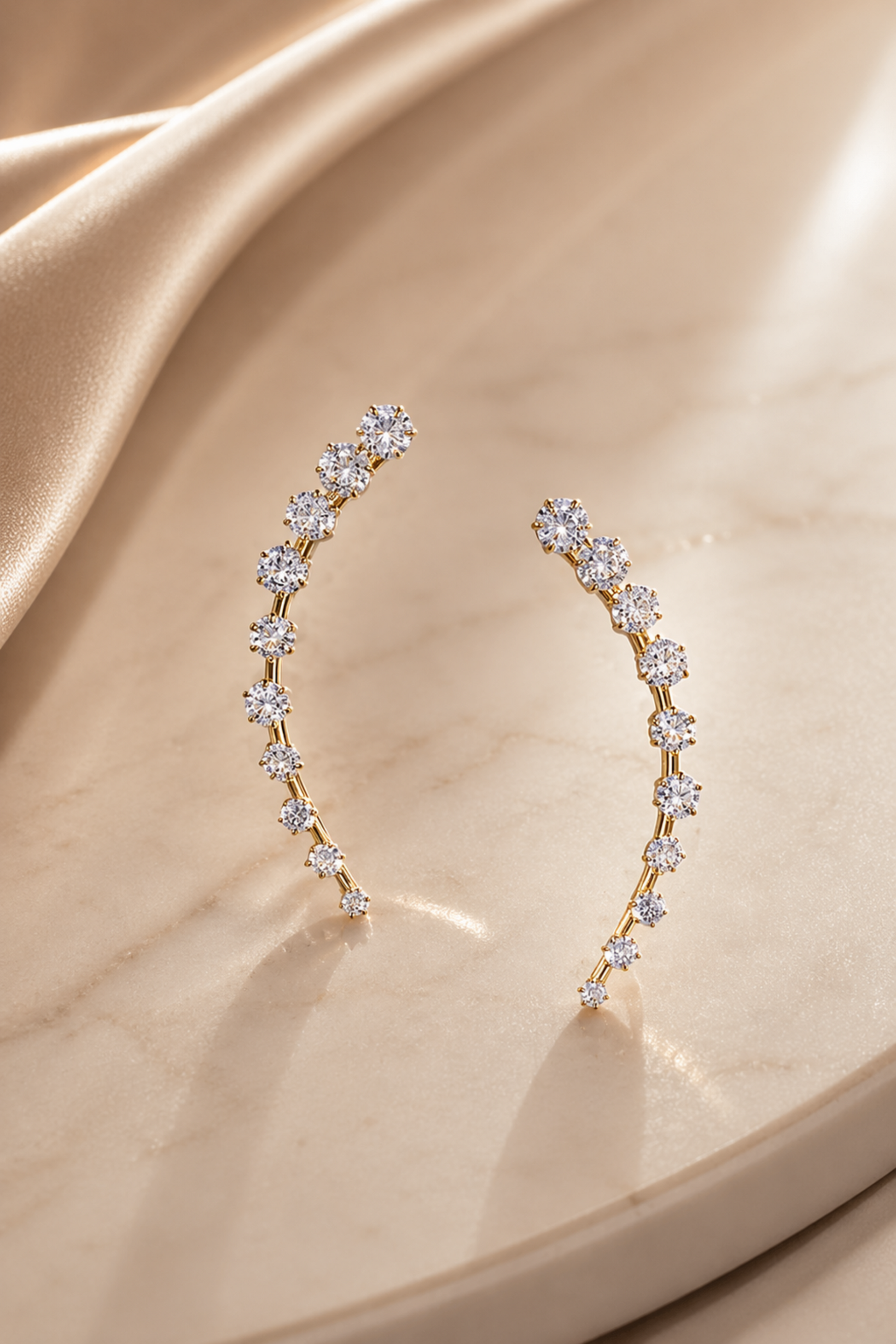 gold zircon ear climber marble background
